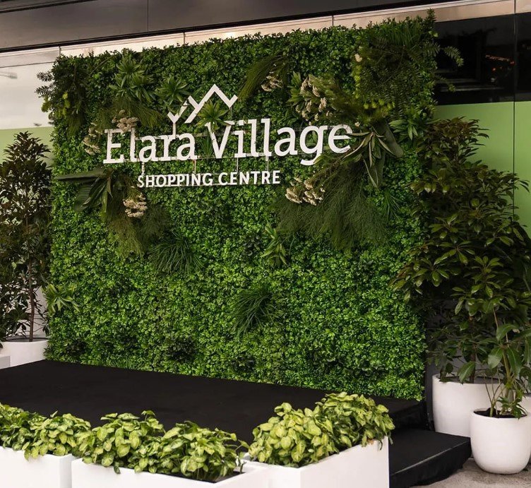 Elara Village, Faux Green Wall, planter boxes.jpg