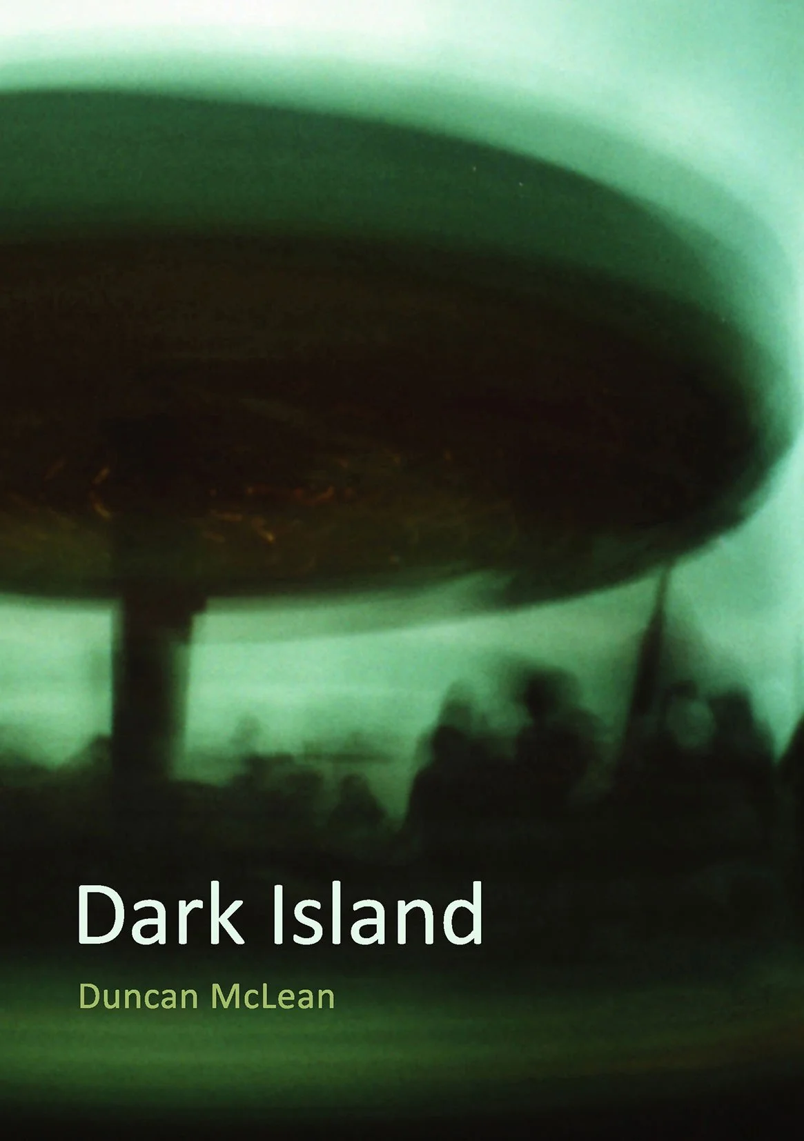 The cover of the book titled 'Dark Island' by Duncan McLean, featuring a dark, abstract image with greenish hues and silhouettes of people and structures.
