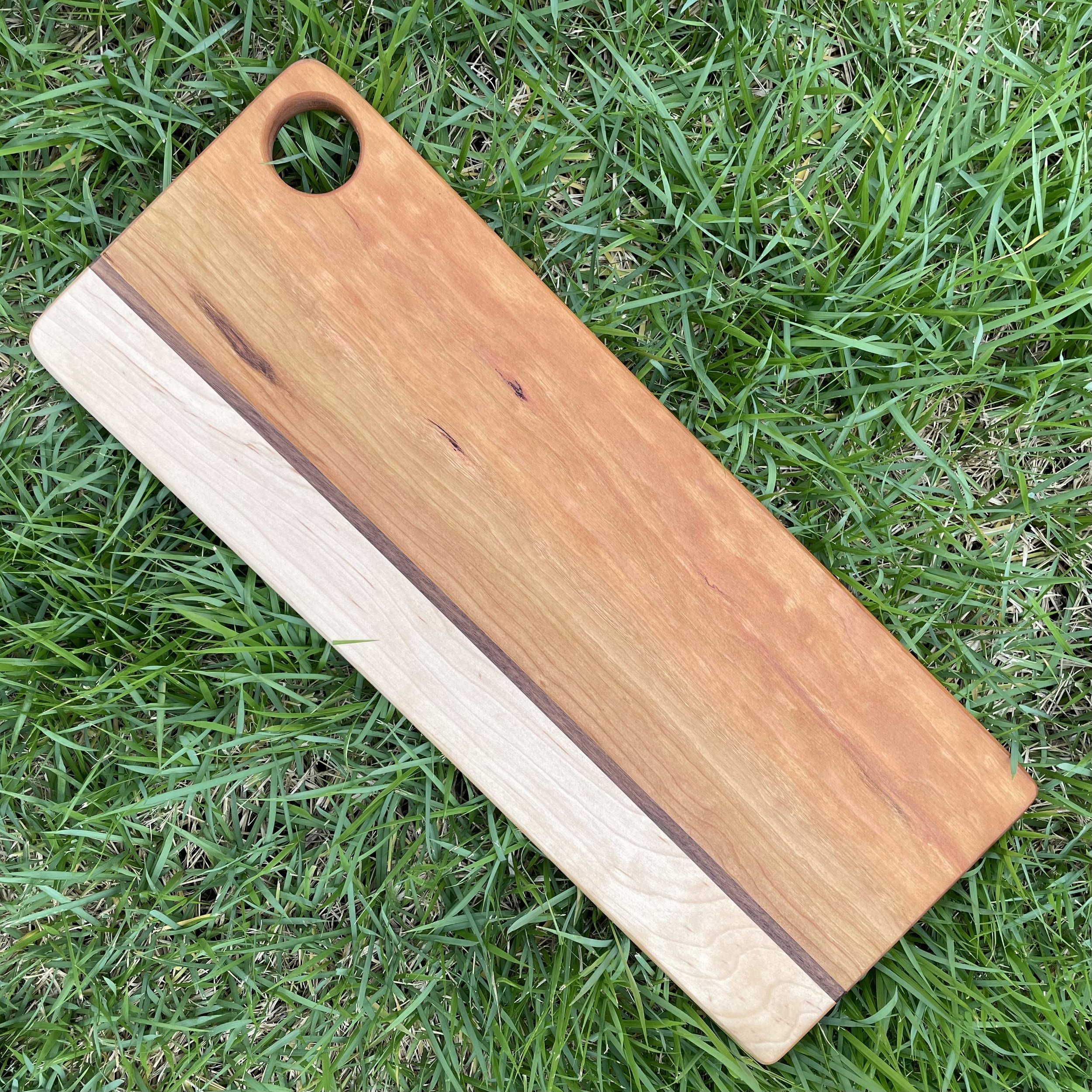 cherry with maple hardwood edge and thin walnut stripe