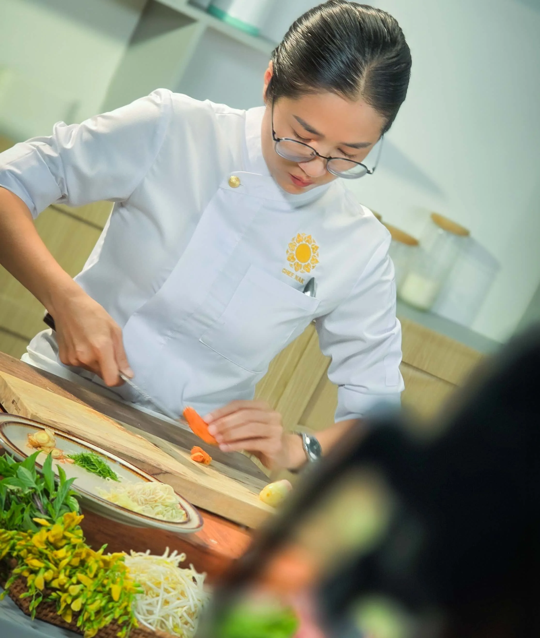 Chef Nak Chopping Vegetables for a Cambodian Dish