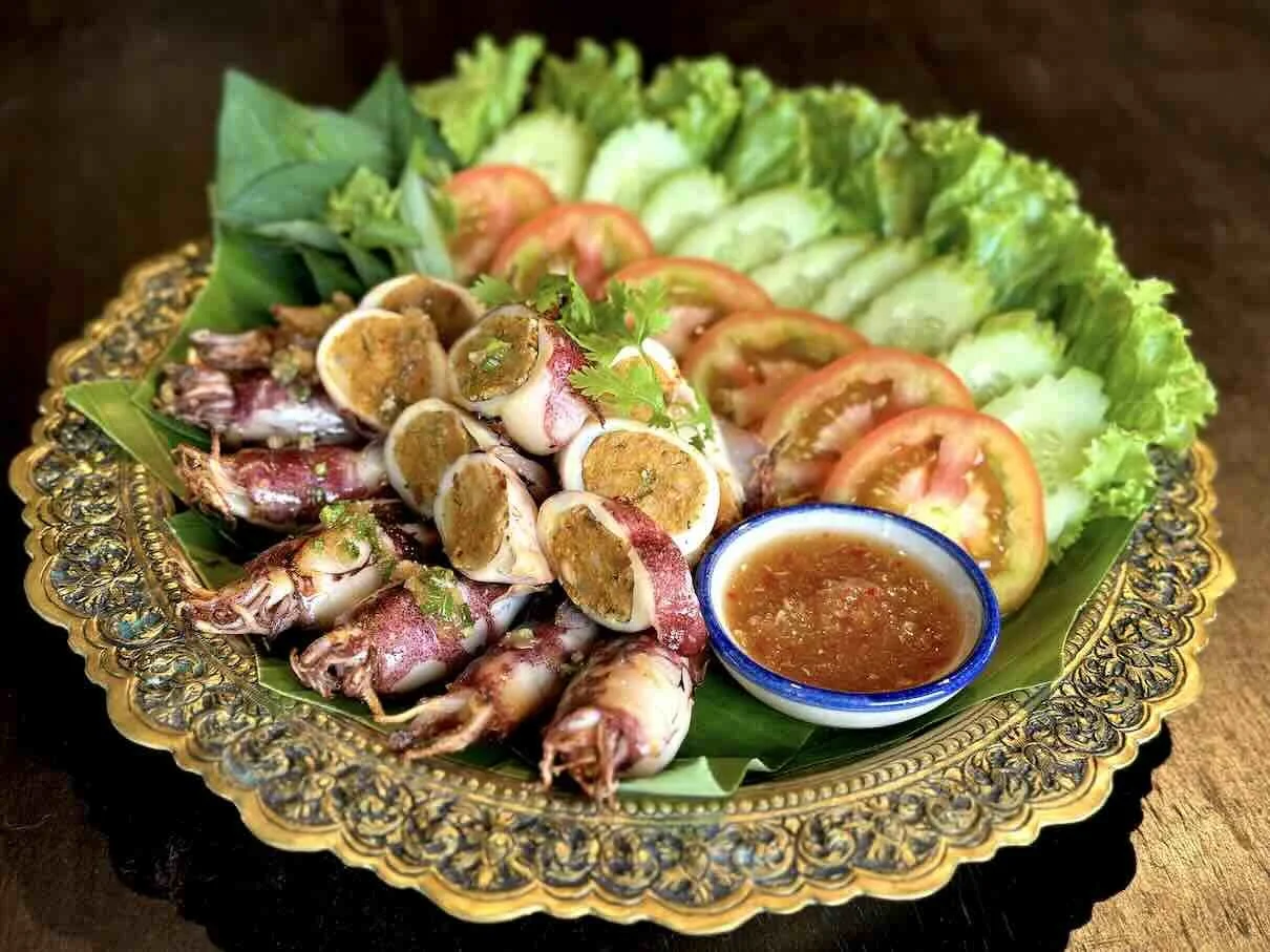 Chef Nak’s grilled stuffed squid with Kroeung and sweet-sour sauce