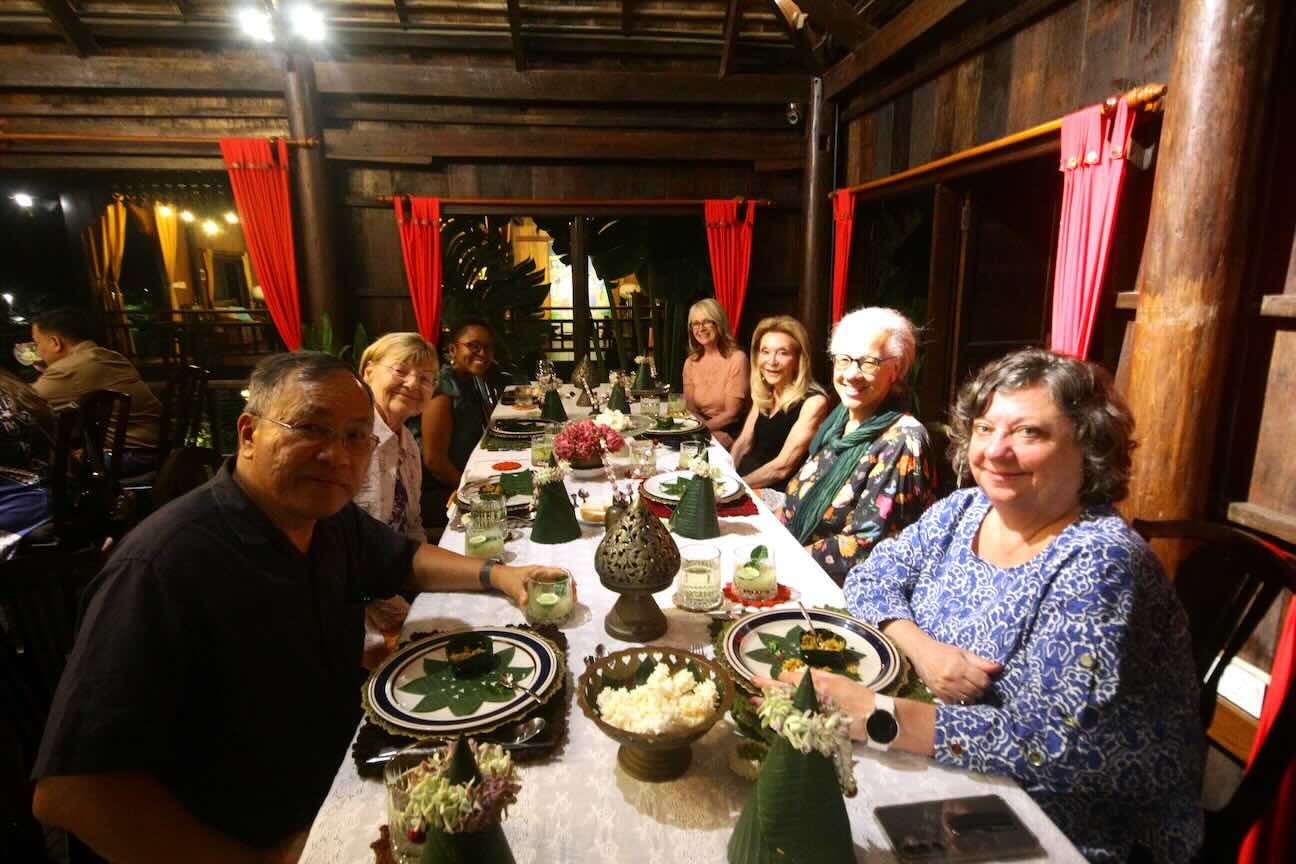 Happy guests at the dining table during Chef Nak’s home dining experience.