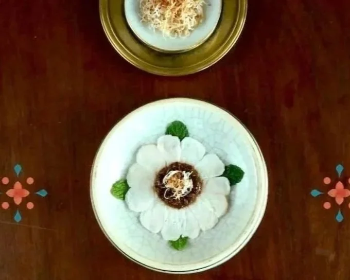 Fish Salad with Shredded Coconut (Plea Moat Teuk) from Chef Nak’s SAOY—Cambodian lime-cured fish salad with toasted coconut, herbs, and peanuts.