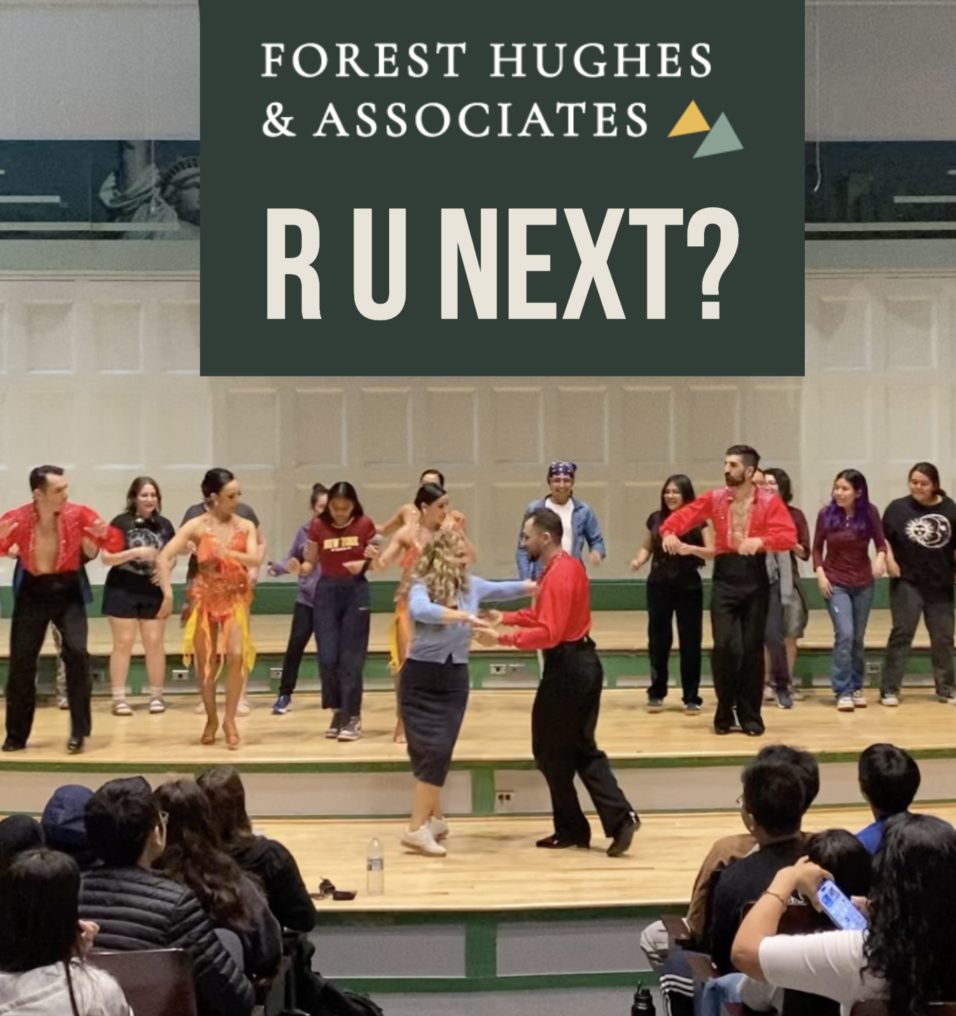 Teachers and students dancing on stage to Bad Bunny in a NYC School Performance. Borough Moves NYC Professional Latin Dance team bringing Latin Dance into NYC Public Schools to students, scholars, parents, and families.