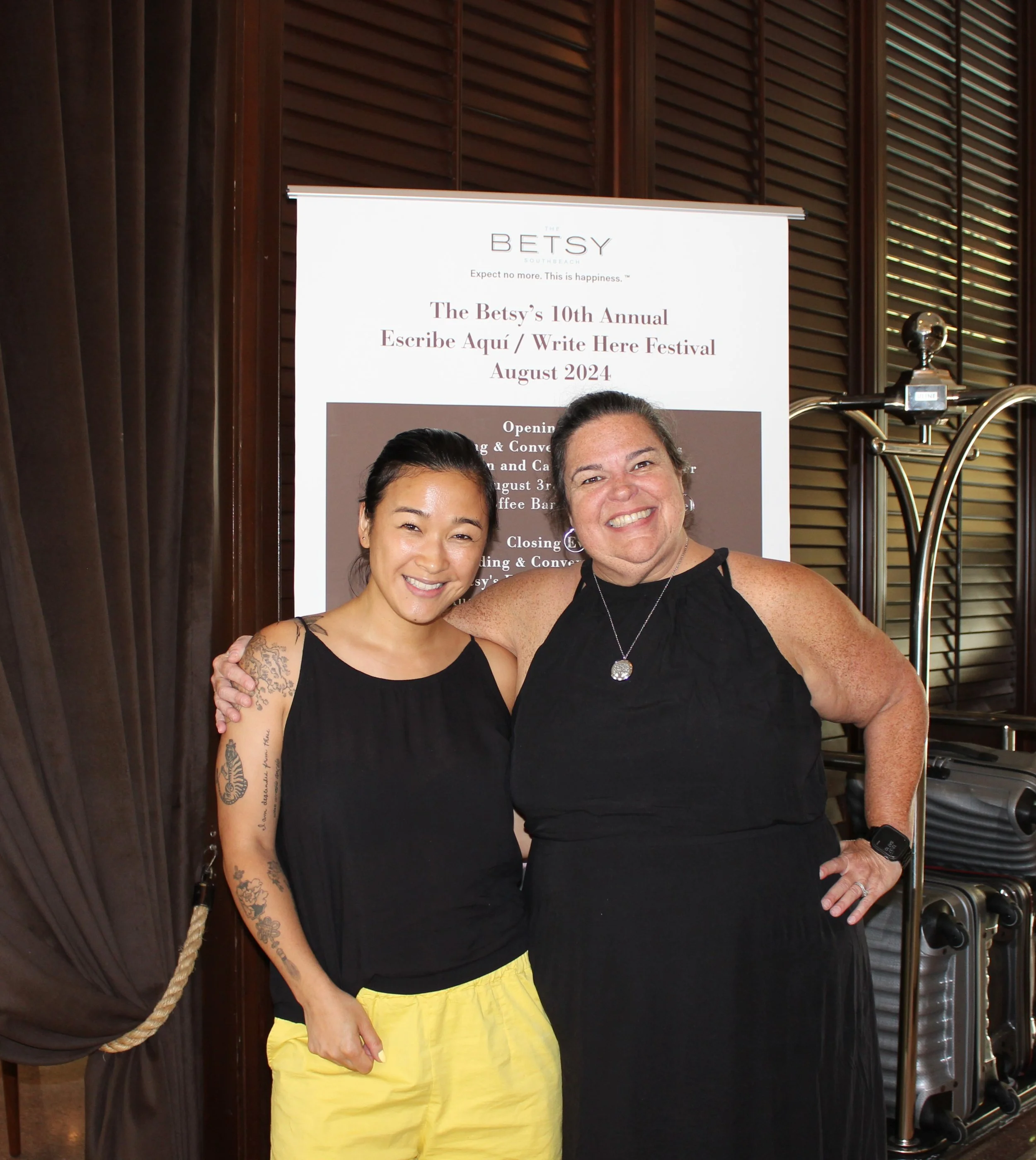 Liz Kleinrock (L) with Caridad Moro-Gronlier, Miami-Dade Poet Laureate 2024 (R) at The Betsy, August 2024