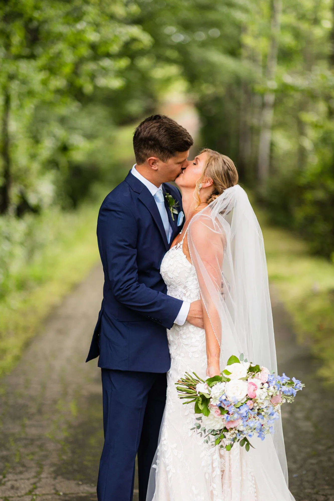 greenbrier-farms-wedding-easley-sc-18-bride-groom-portrait-wooded-lane.jpg