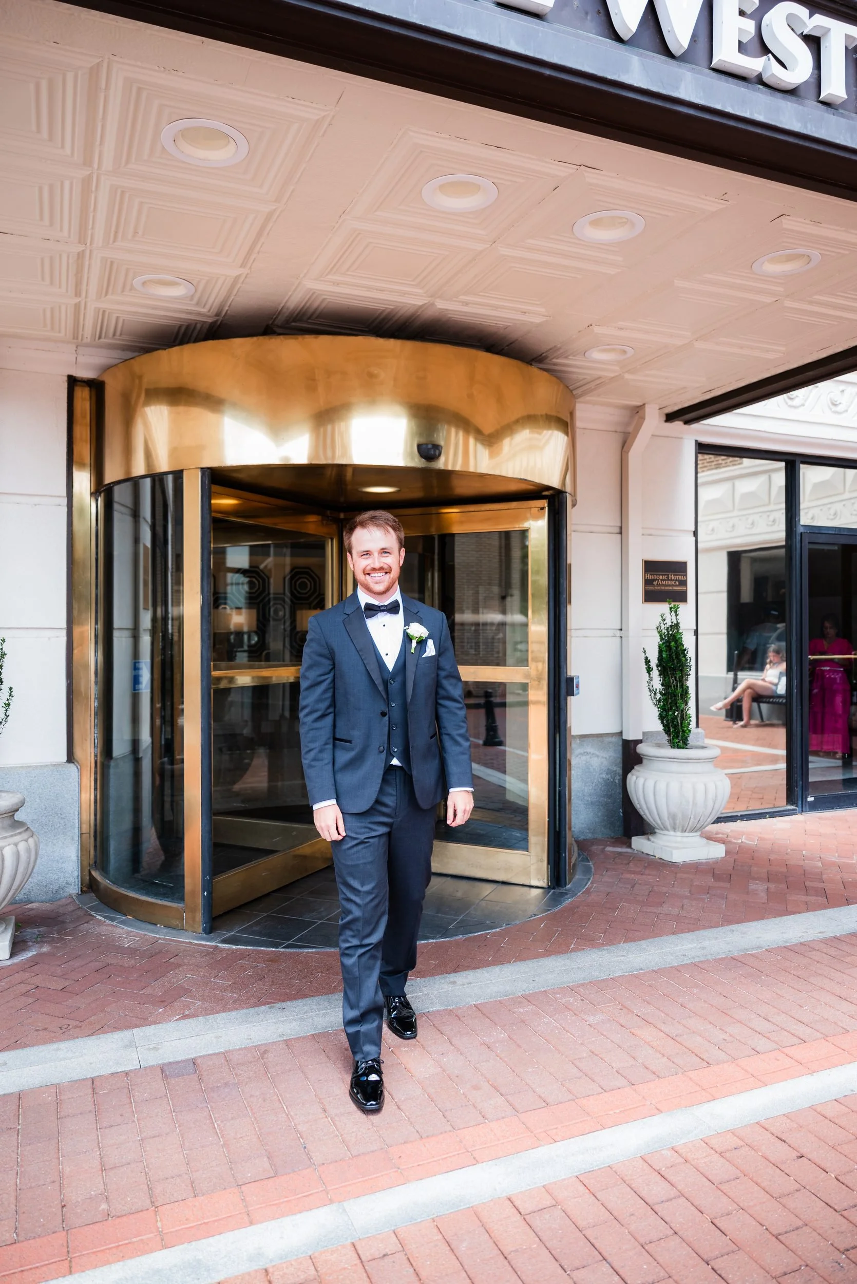 09-westin-poinsett-revolving-door-groom.jpg