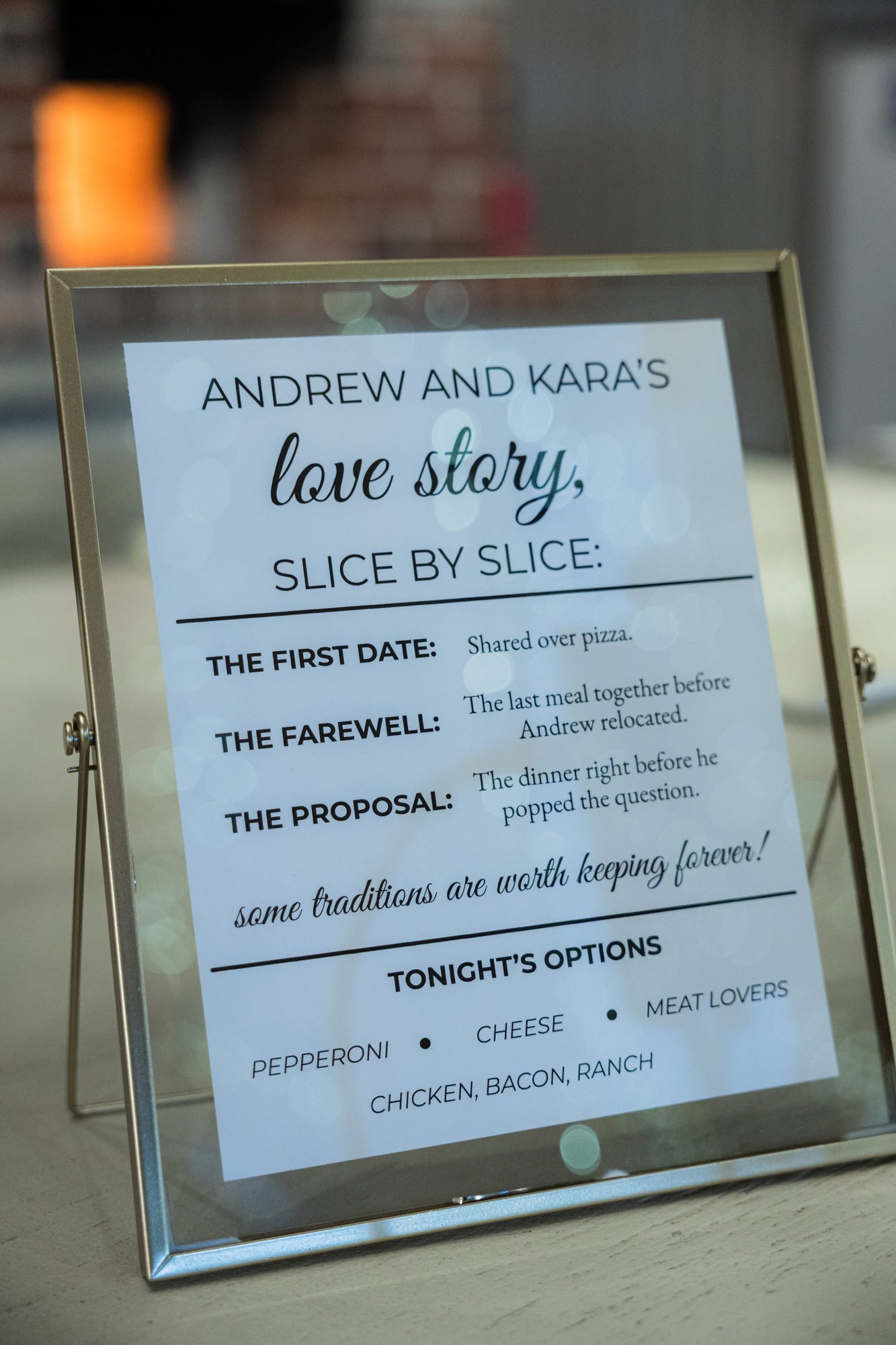Pizza love story sign at the late night food station at a Greenbrier Farms wedding