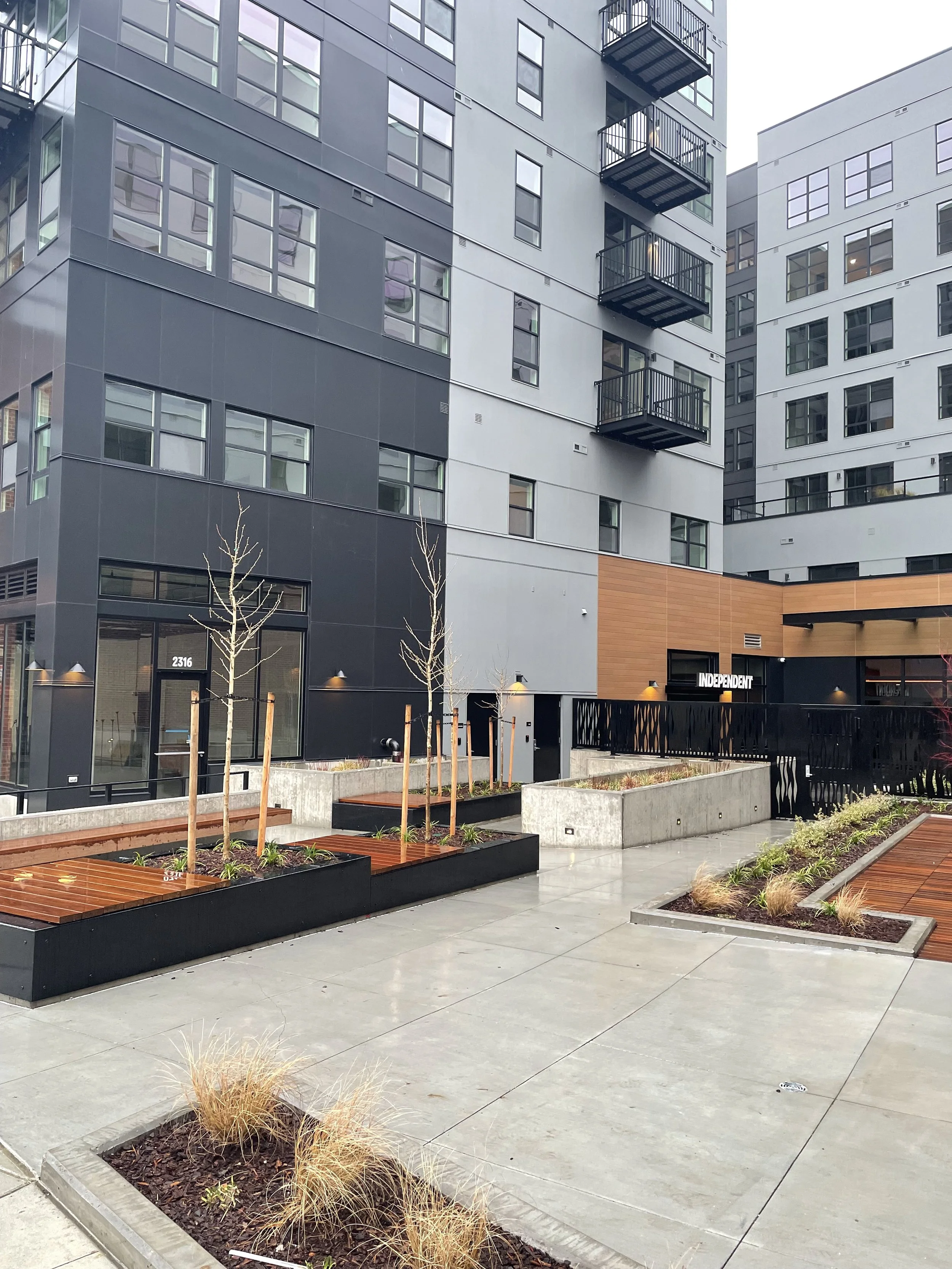 H24&M SiteVisit 20241227 Ext Entry Courtyd 02.JPG