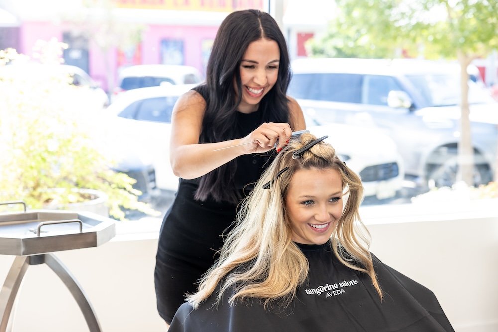 Tangerine Salon Highland Village interior showcasing luxury hair color and styling services