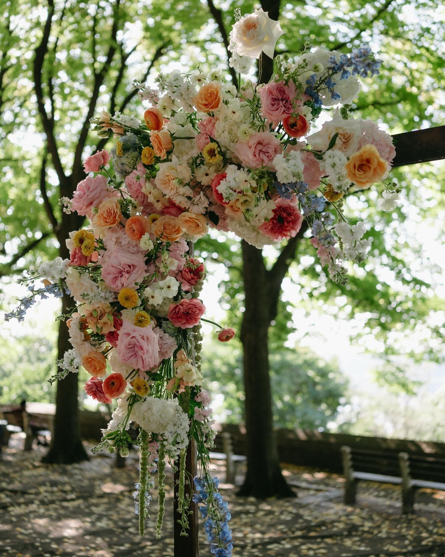 the prettiest arrangements by @snowdrop_flowers for P + J&rsquo;s magical Fort Tryon Park wedding 🪻

📷: @marianasotophotography