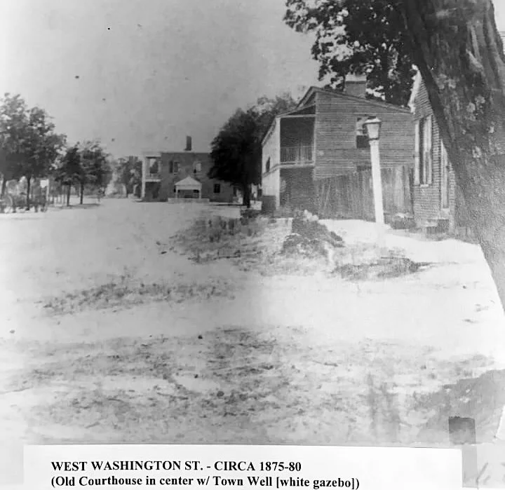Looking east toward the Courthouse from West Washington Street,--The gazebo in the distance shades the town well.