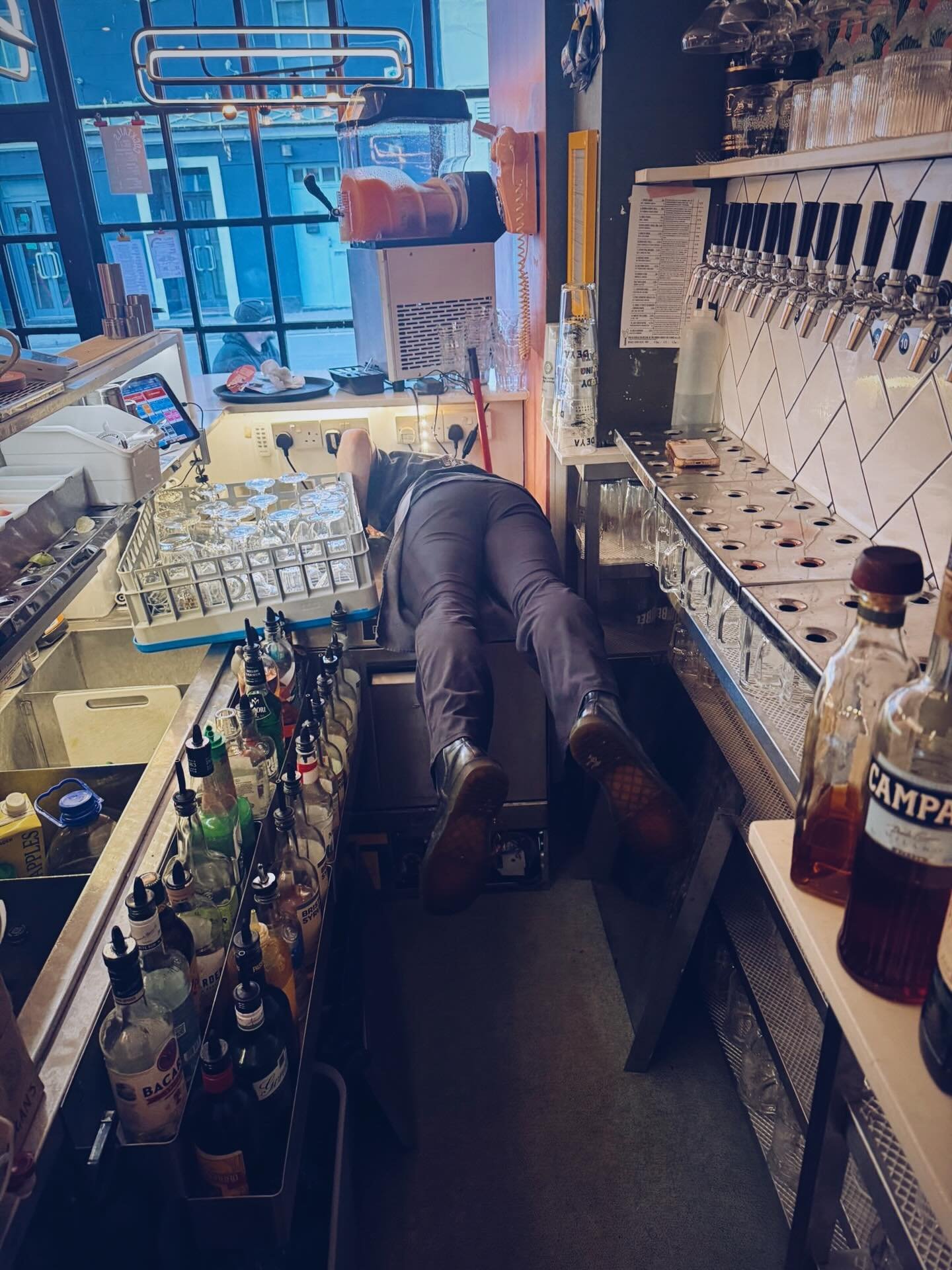 Life has been a lot like this lately. Arse over tit behind the glass washer trying to disconnect the leaking waste pipe which broke 17 minutes after an engineer fixed a different fault on it. 

Far from glamorous + certainly leaving no time to take +