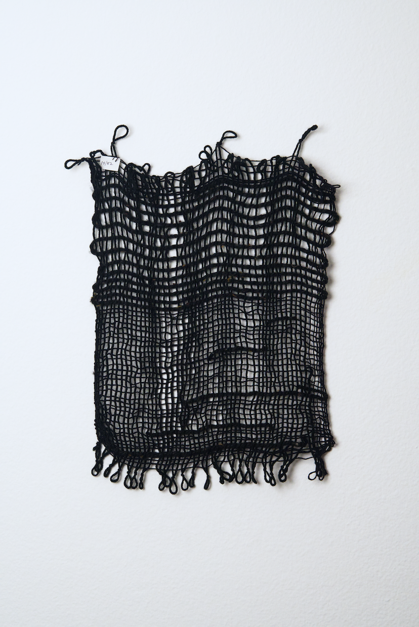 Neutral shades of white, tan, gold, brown, black and orange yarn to provide a visual record of the shift in feelings from week to week over the course of one year.