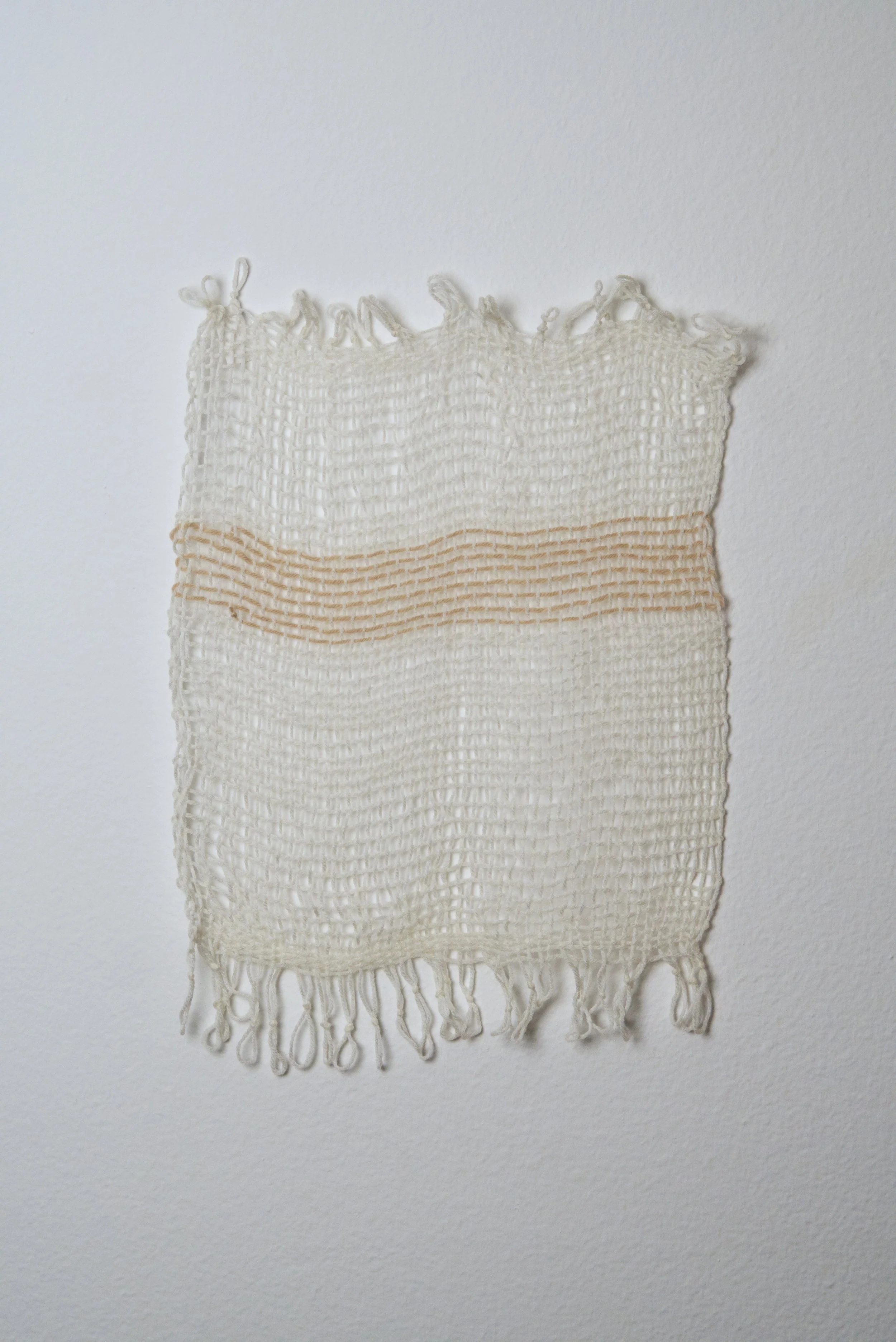 Relatively Permanent 8/52 
approximately 14" x 18",   yarn, 2024. 
