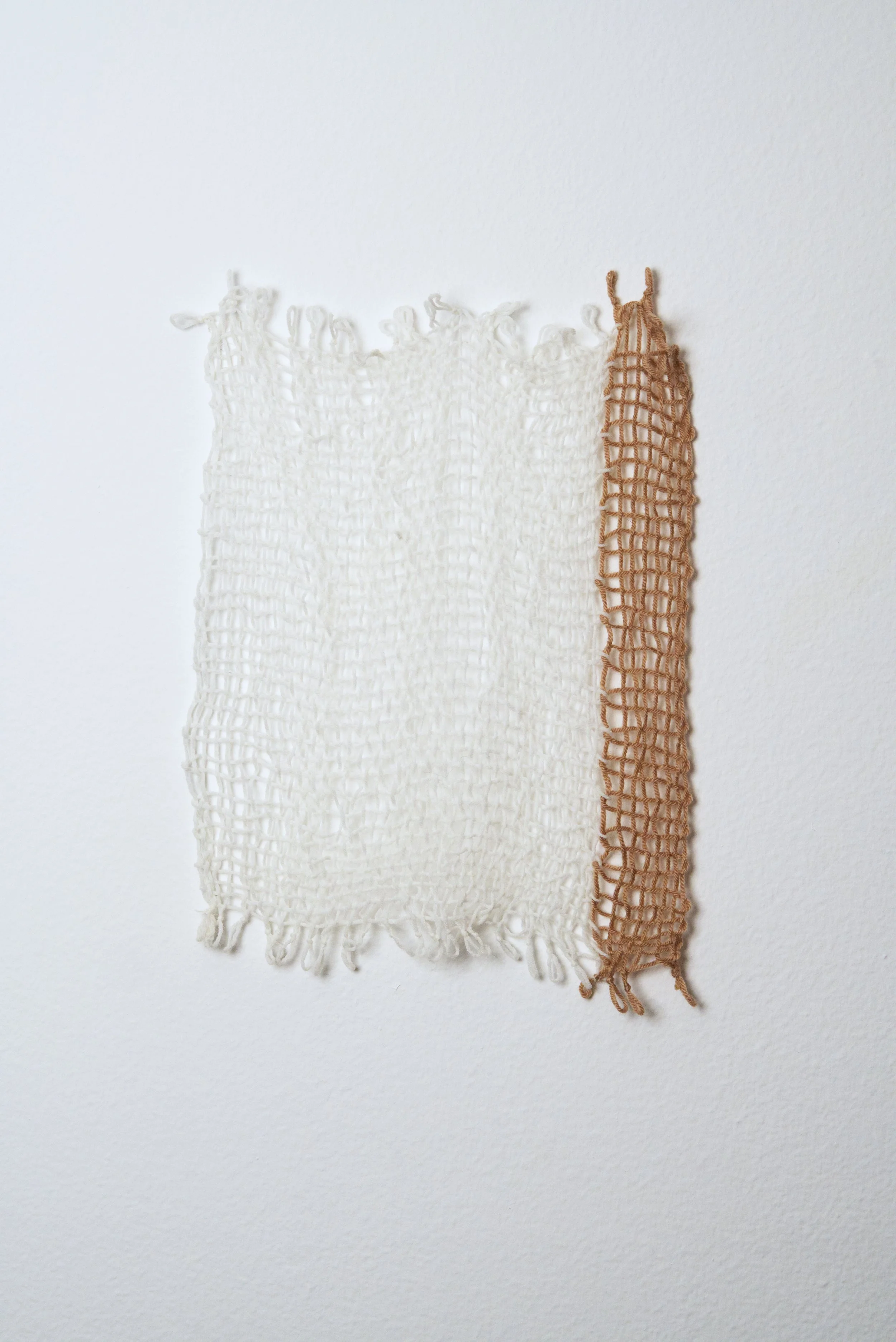 Relatively Permanent 36/52 
approximately 14" x 18",   yarn, 2024. 