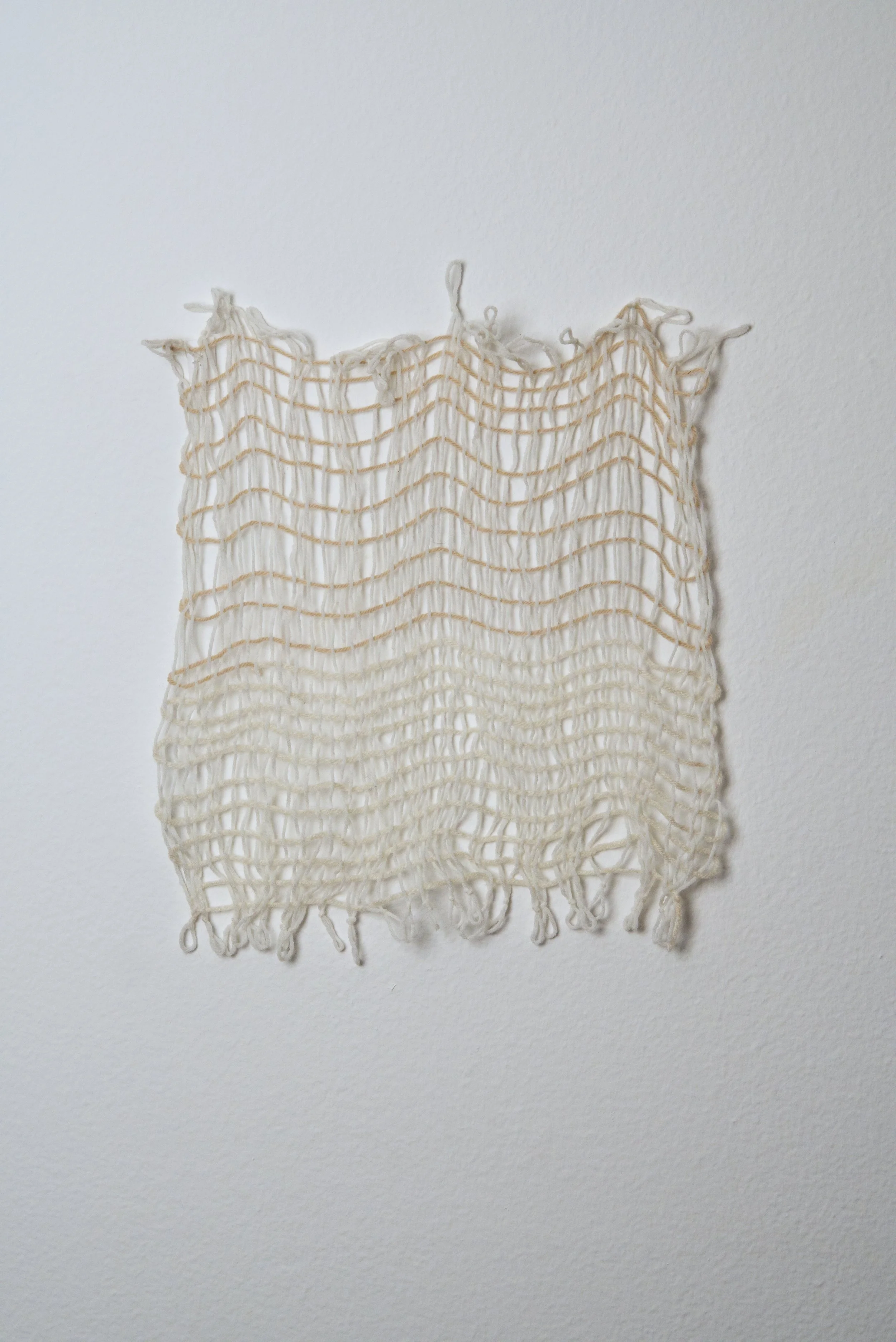 Relatively Permanent 13/52 
approximately 14" x 18",   yarn, 2024. 