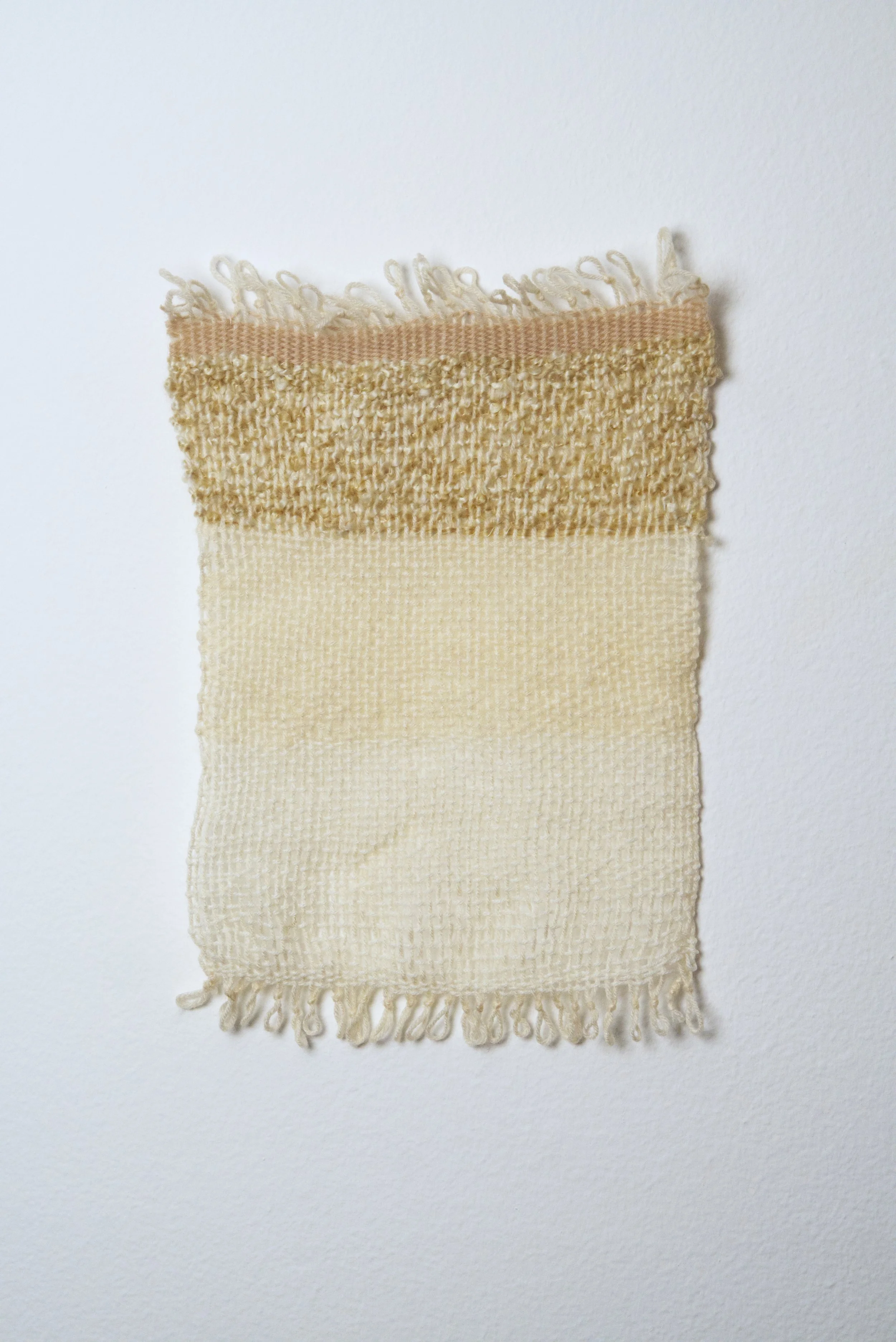 Relatively Permanent 9/52 
approximately 14" x 18",   yarn, 2024. 