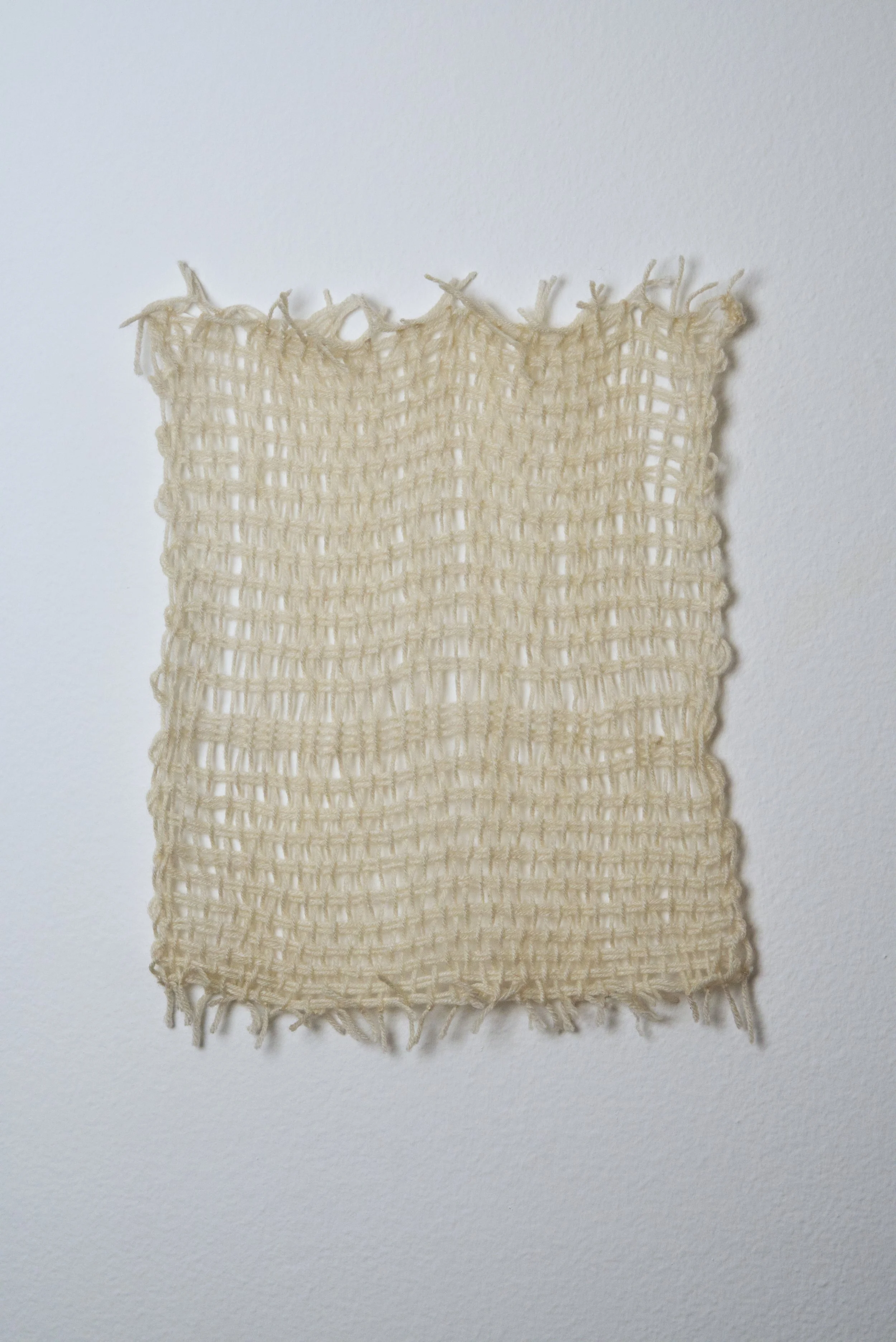 Relatively Permanent 2/52 
approximately 14" x 18",   yarn, 2024. 