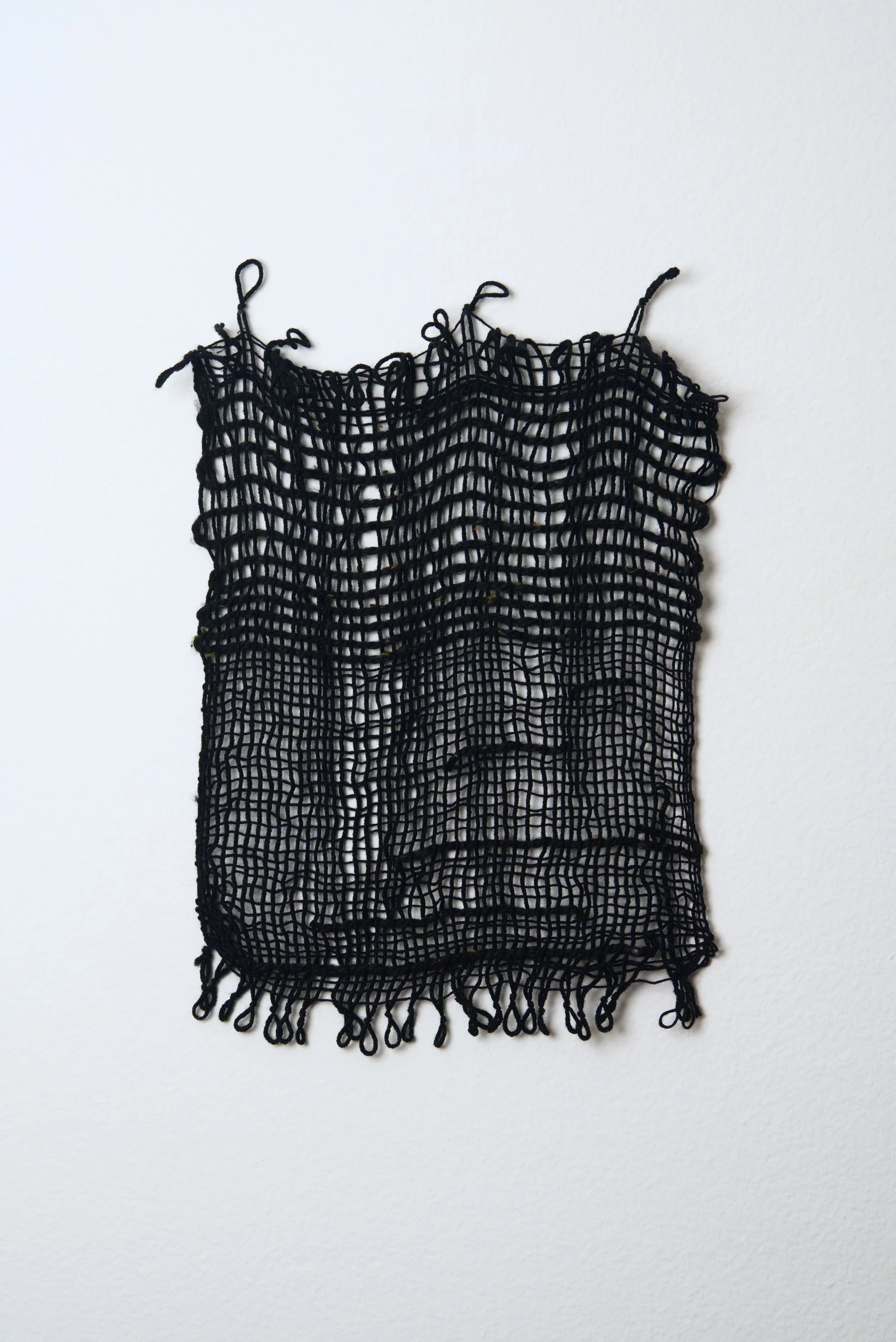 Relatively Permanent 14/52 
approximately 14" x 18",   yarn, 2024. 