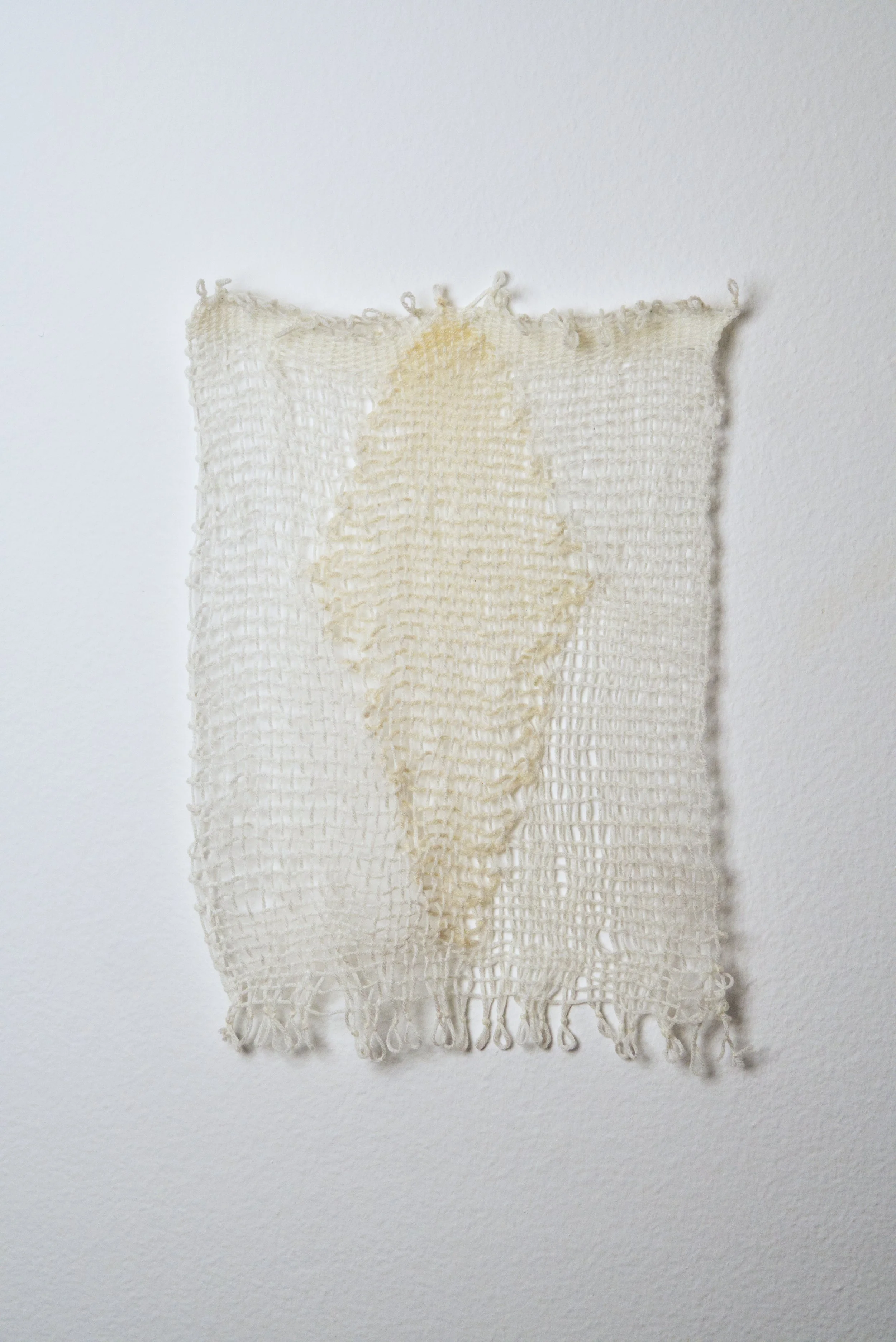 Relatively Permanent 45/52 
approximately 14" x 18",   yarn, 2024. 