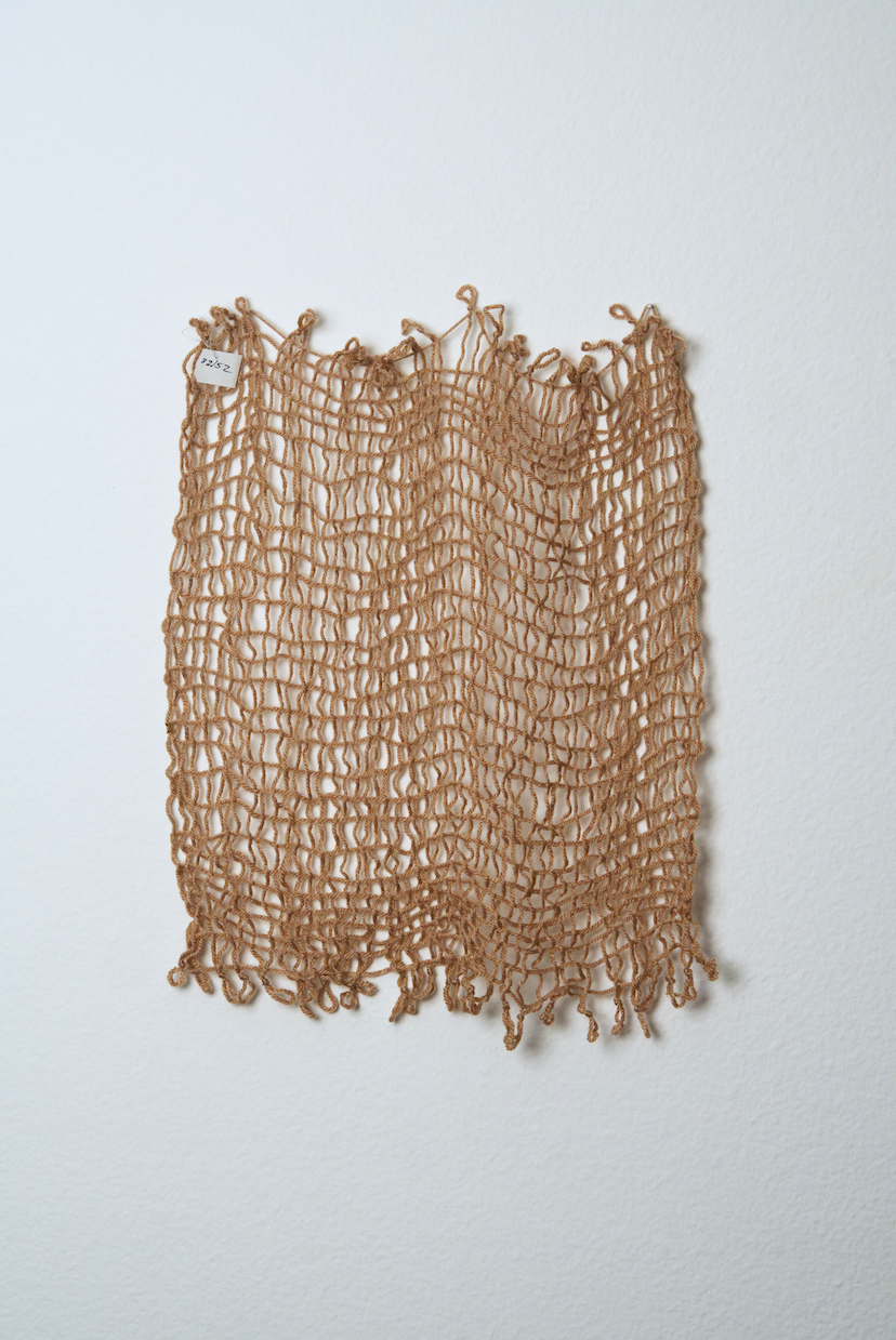 Neutral shades of white, tan, gold, brown, black and orange yarn to provide a visual record of the shift in feelings from week to week over the course of one year.