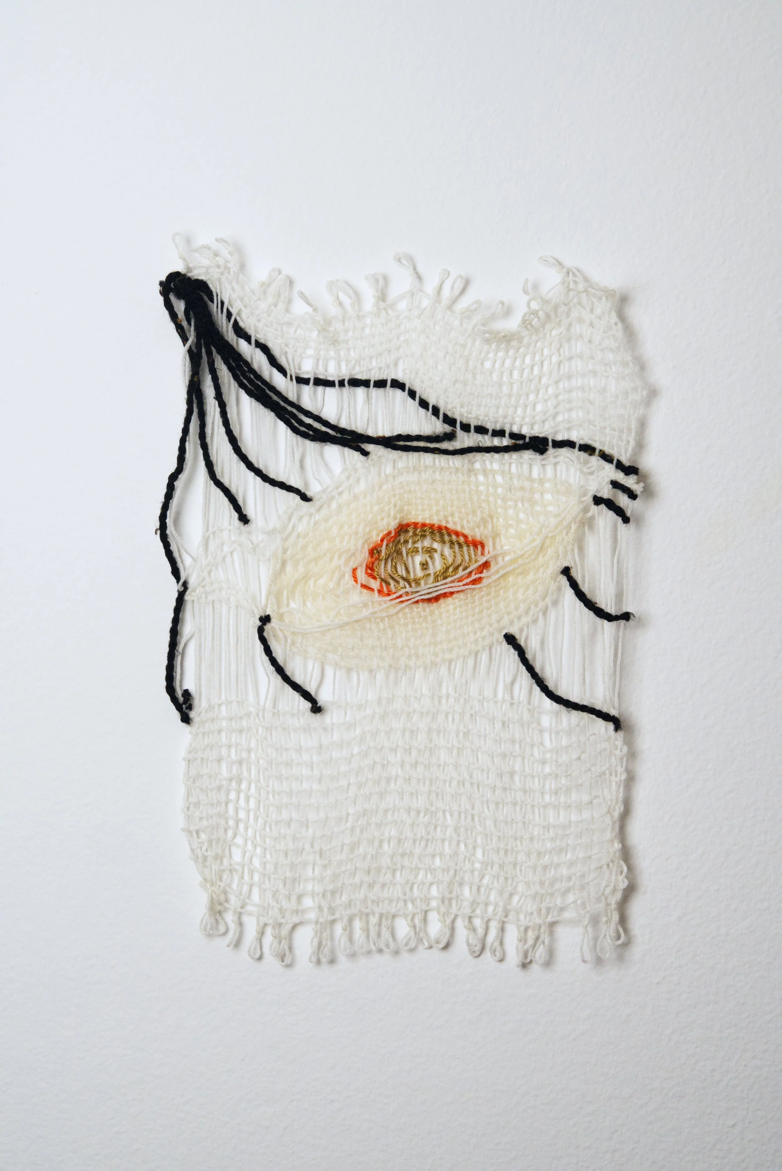Relatively Permanent 44/52 
approximately 14" x 18",   yarn, 2024. 