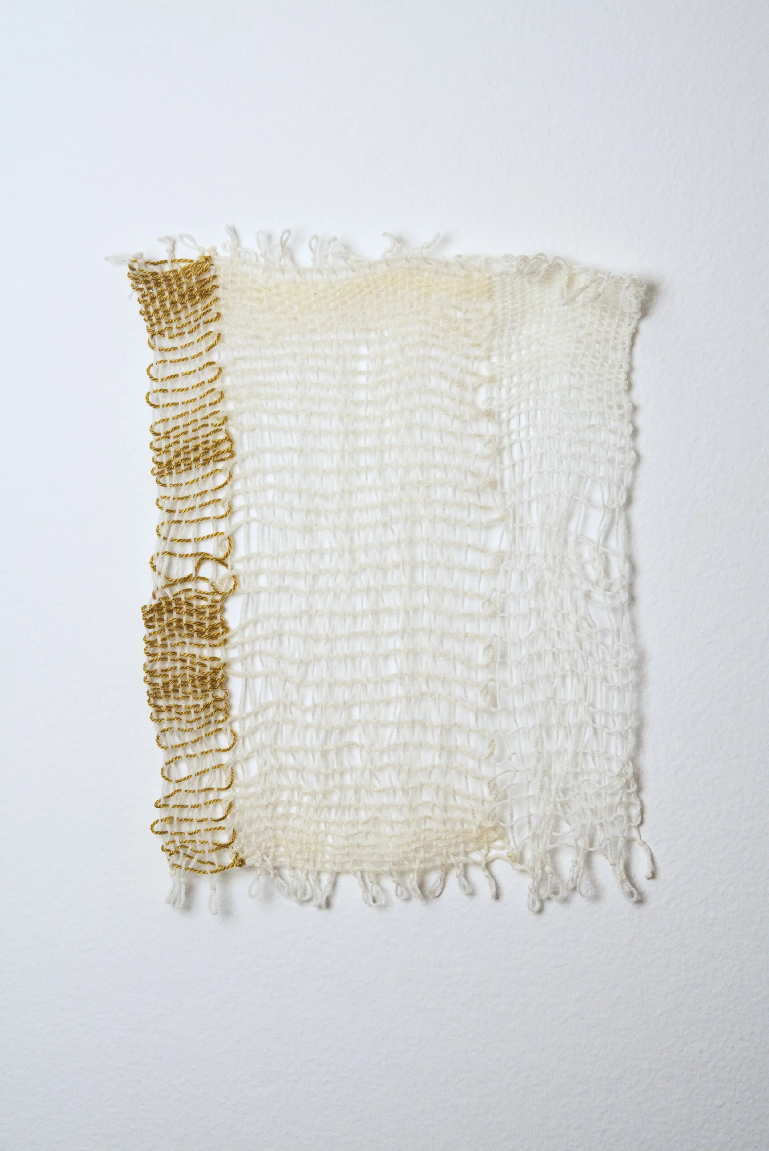 Relatively Permanent 47/52 
approximately 14" x 18",   yarn, 2024. 