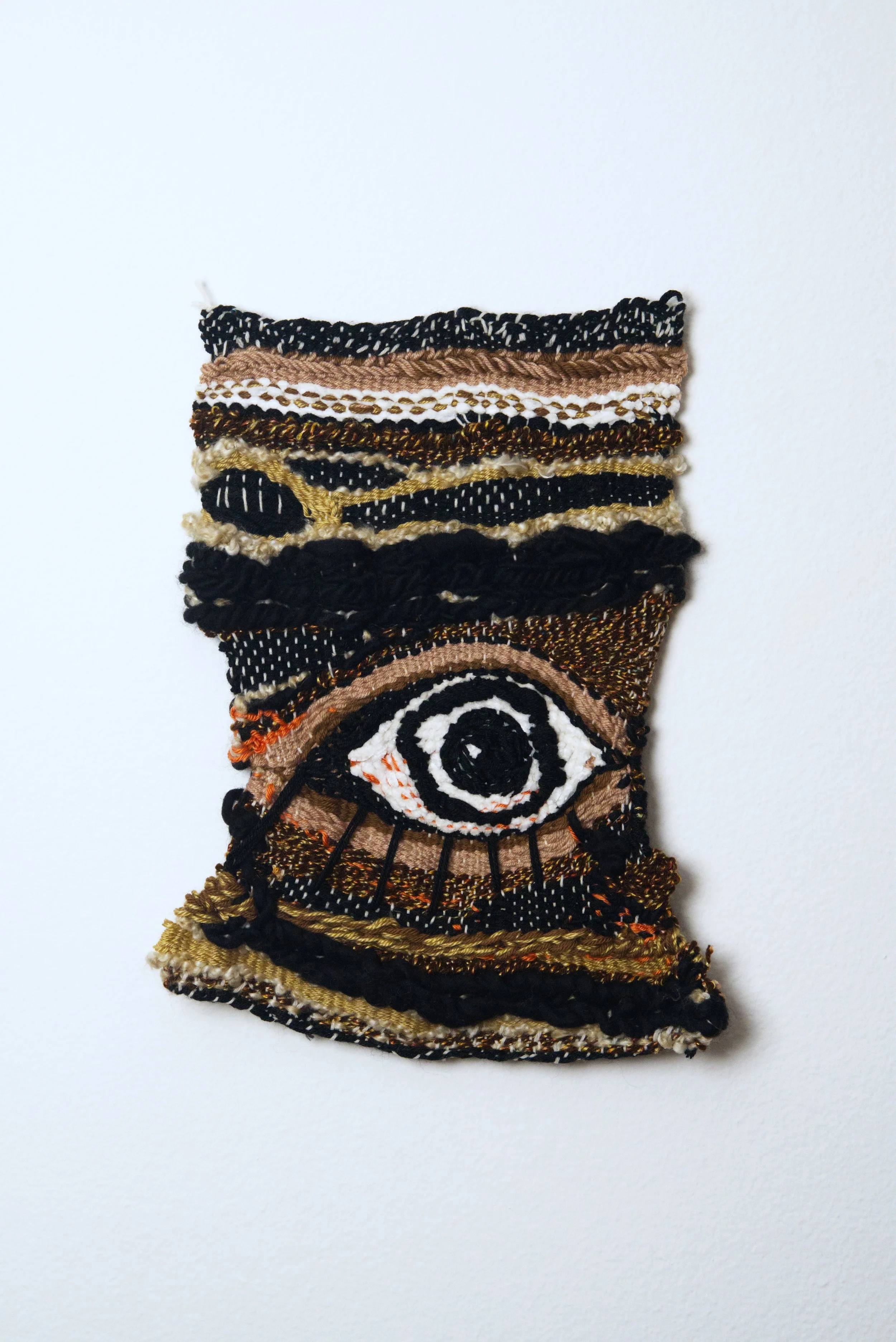 Relatively Permanent 1/52 
approximately 14" x 18",   yarn, 2024. 