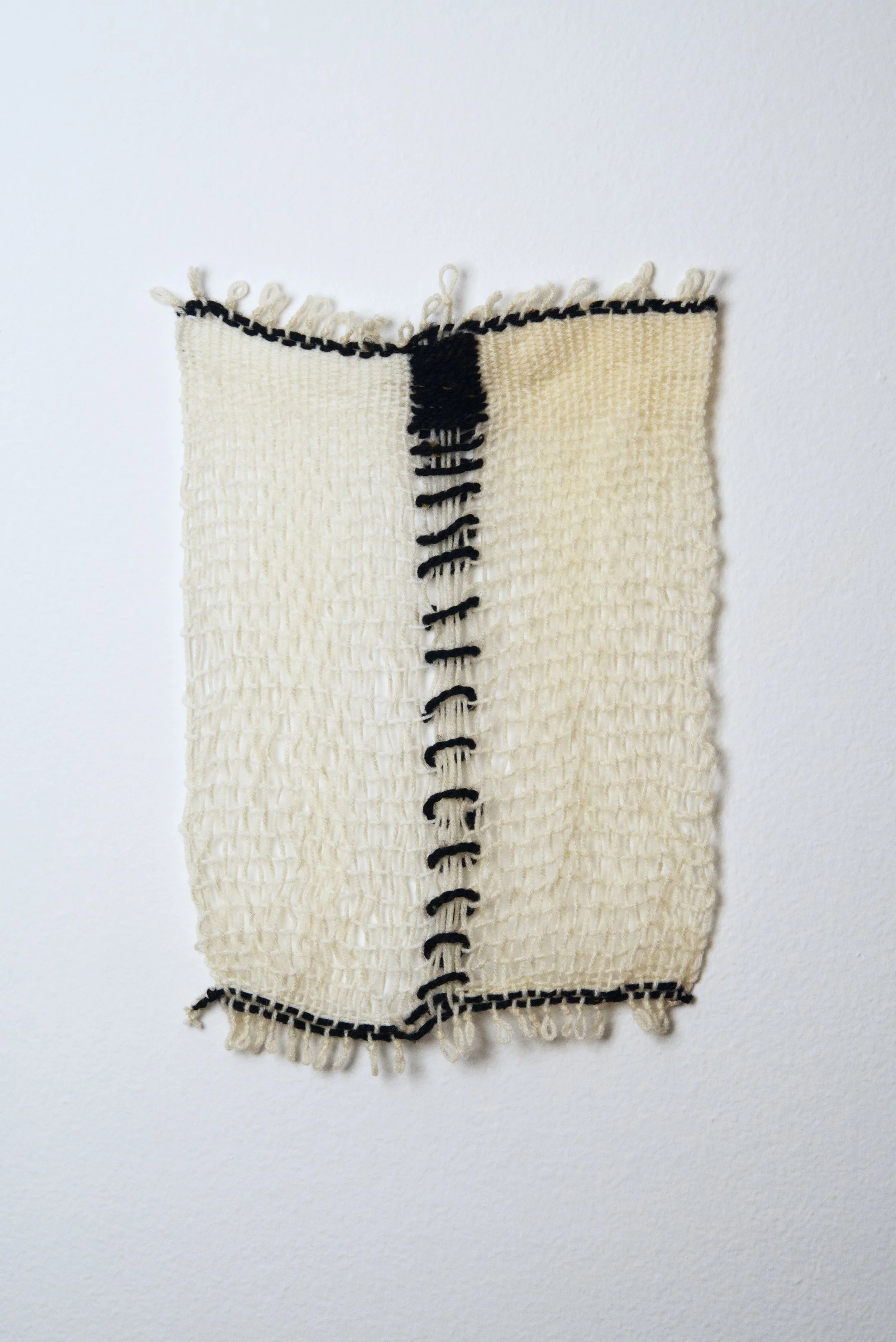 Relatively Permanent 26/52 
approximately 14" x 18",   yarn, 2024. 