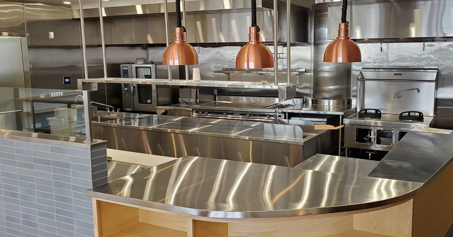 The kitchen for @ernest.sf is looking beautiful! Check out the radiused front counter, custom insulated oyster bar, and rolled column cladding with matching table backsplash.