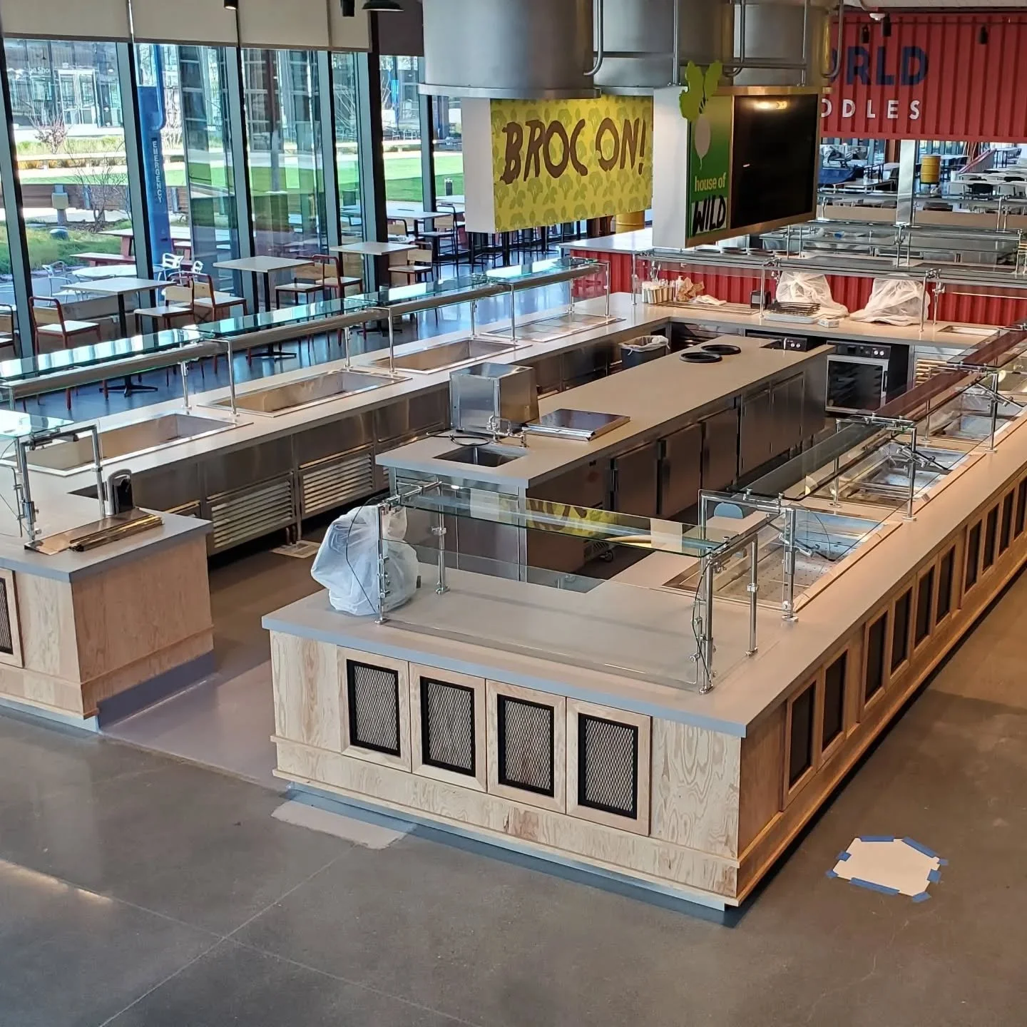 Full corporate cafeteria including custom service counters with louvered doors. All custom stainless built by Seaport Stainless.