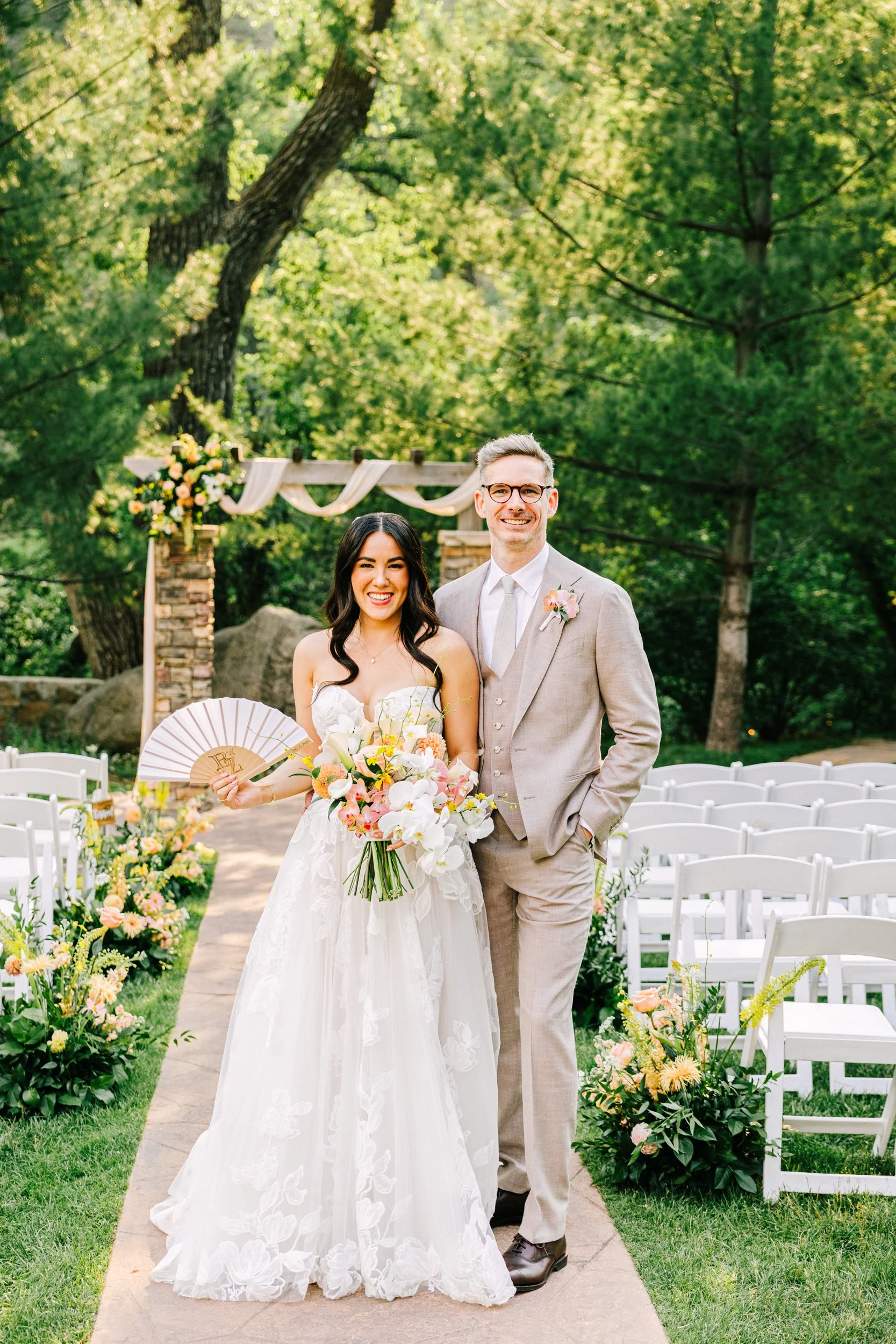 Bride and groom on the ceremony lawn at Boulder Creek by Wedgewood Weddings