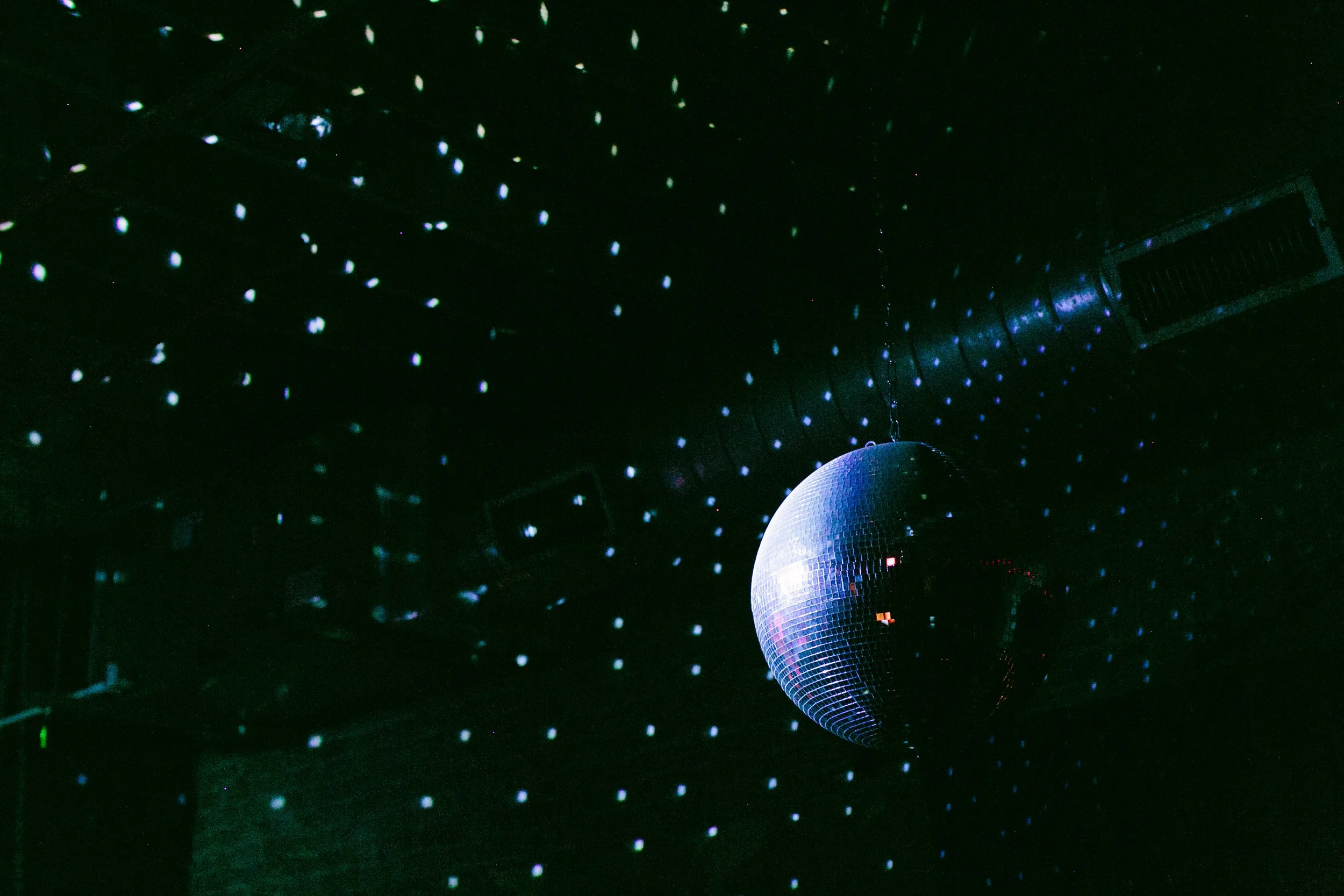 Disco ball hanging above the crowd at a SXSW event in Austin, Texas.