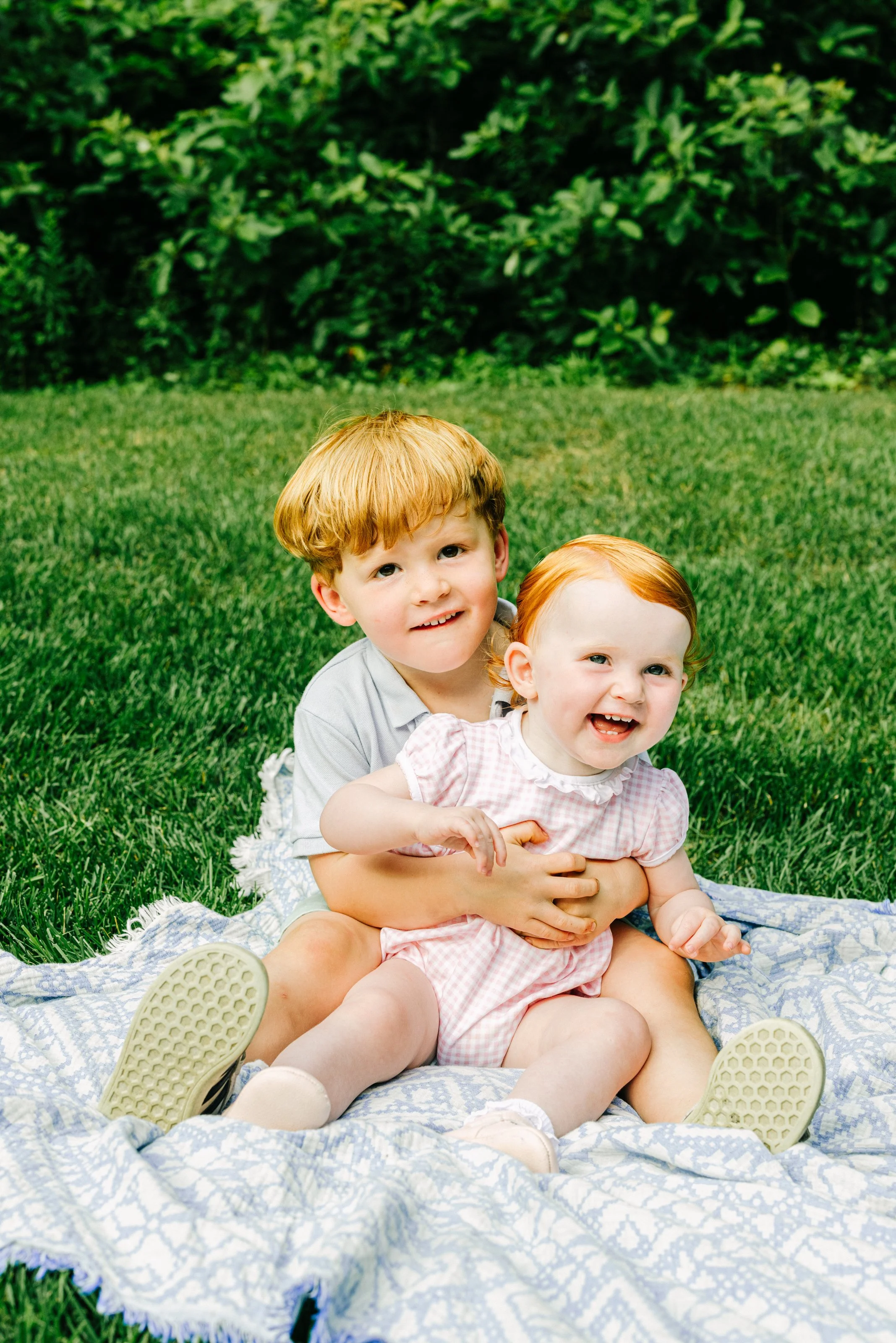 children laughing during Denver family session