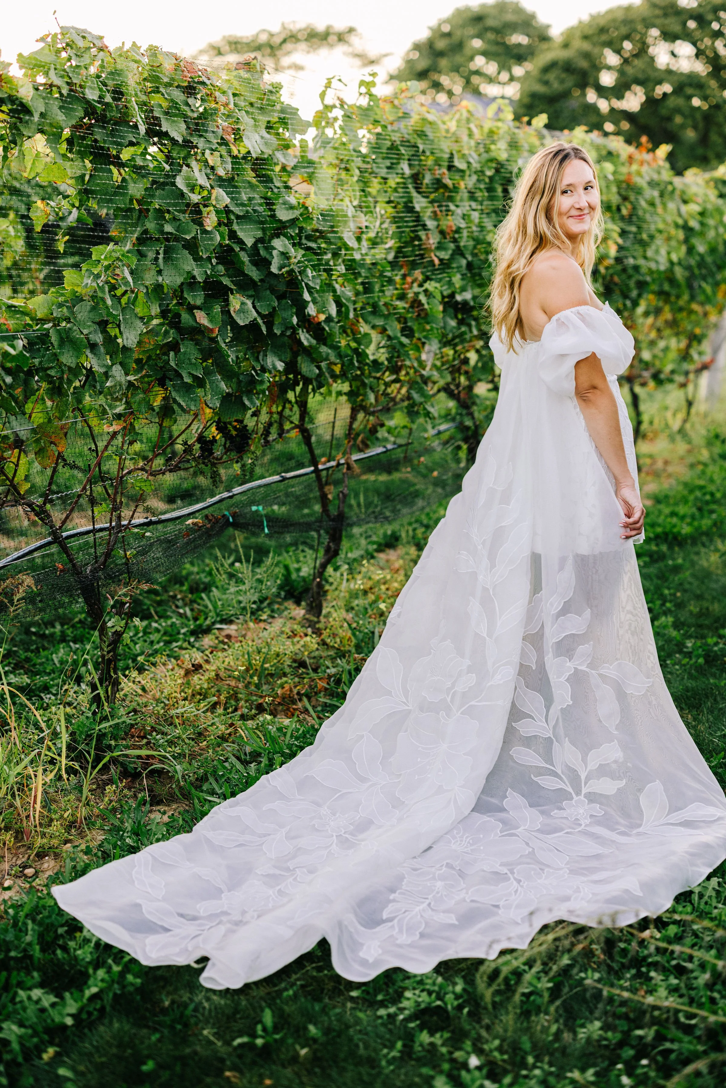beautiful bride smiling during golden hour sunset