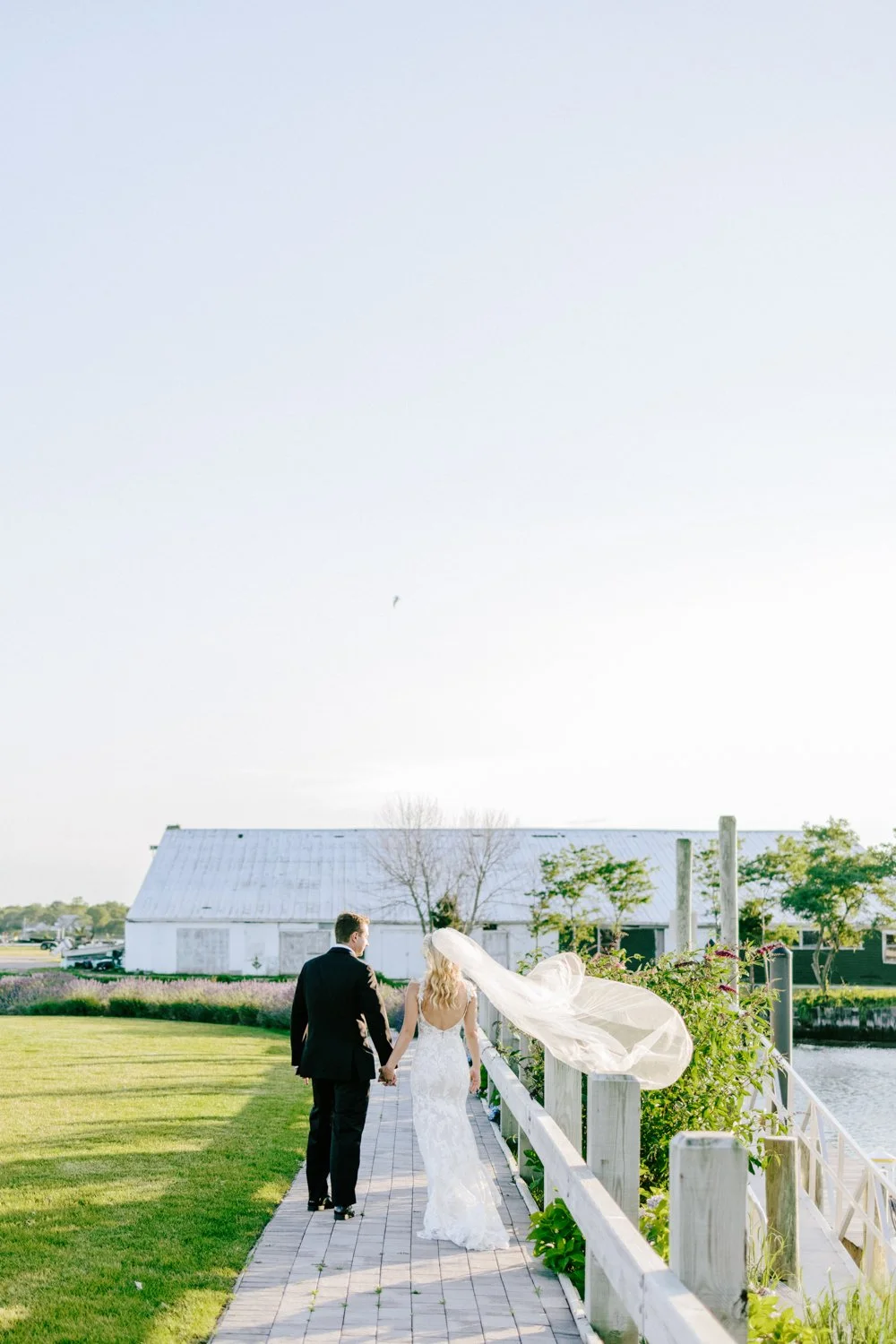 New York couple walking hand in hand just after their elopement.