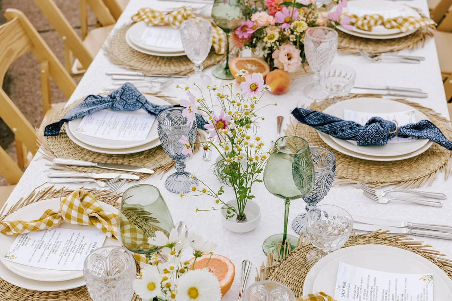 a beautiful outdoor tablescape at a little nell aspen wedding on a sunny afternoon
