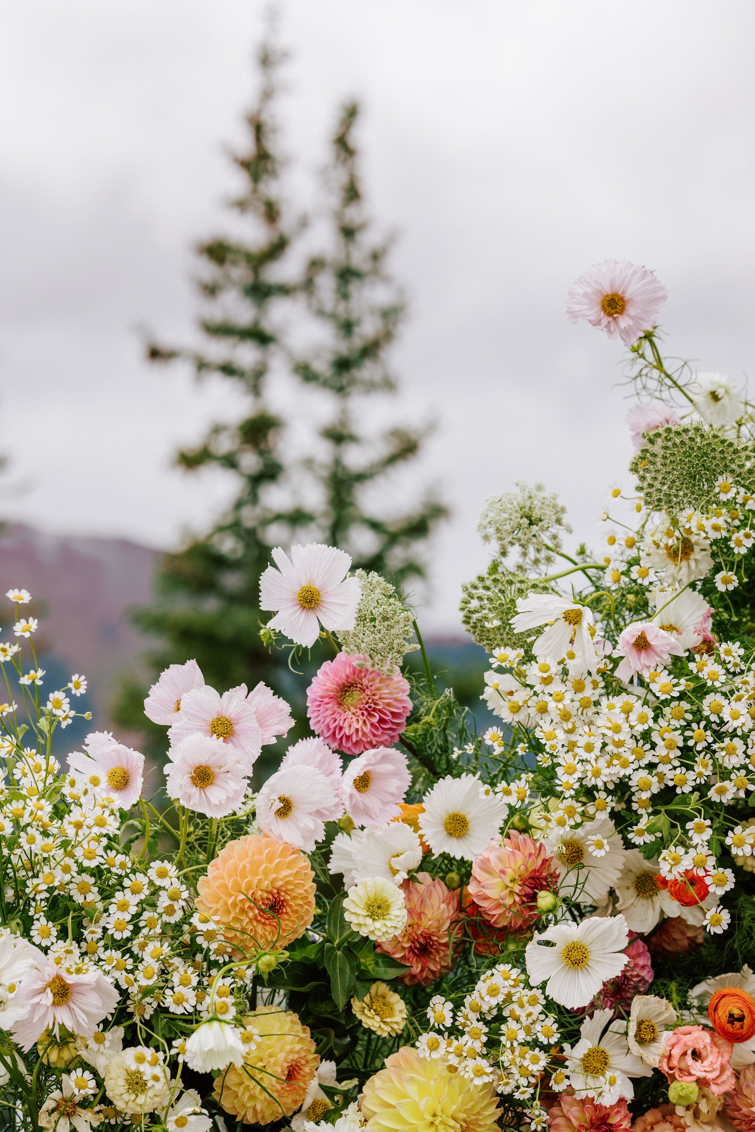 floral arrangement at an outdoor Little Nell wedding ceremony on Aspen Mountain in Aspen Colorado