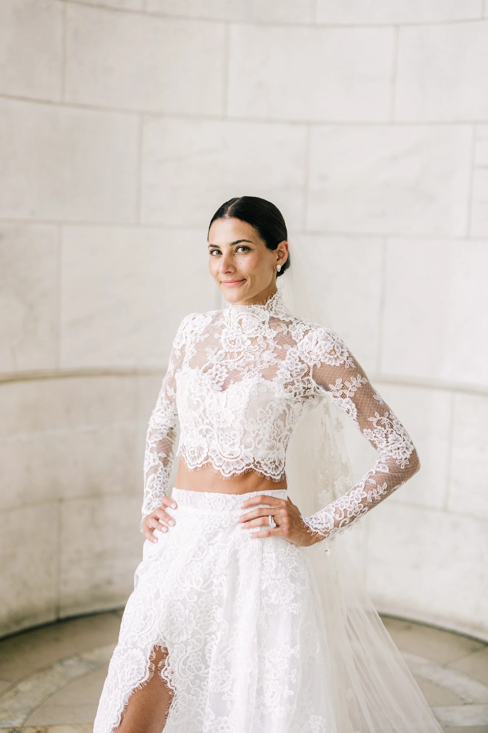 Close-up bridal portrait of bride in her stunning lace wedding gown at the New York Public Library, NYC wedding