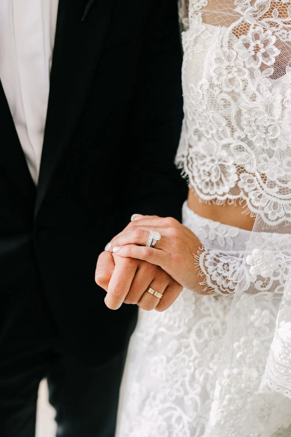 bride and groom holding hands on their new york city wedding day at cipriani 42nd street