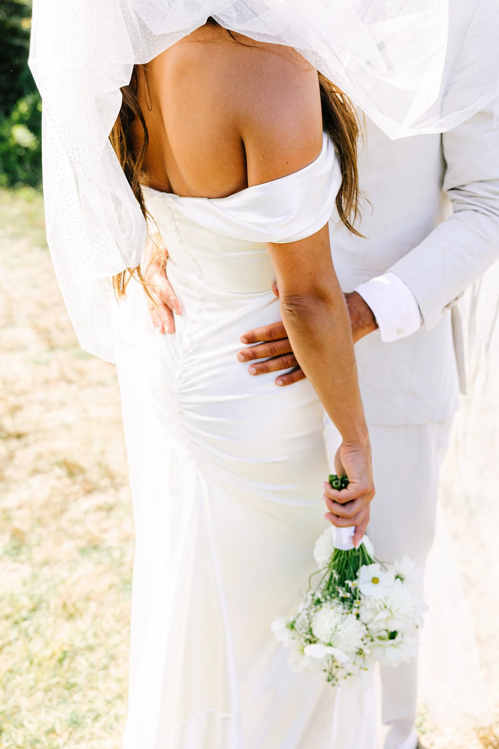 Beautiful close up photo of a bride and groom embracing during their New York City elopement.