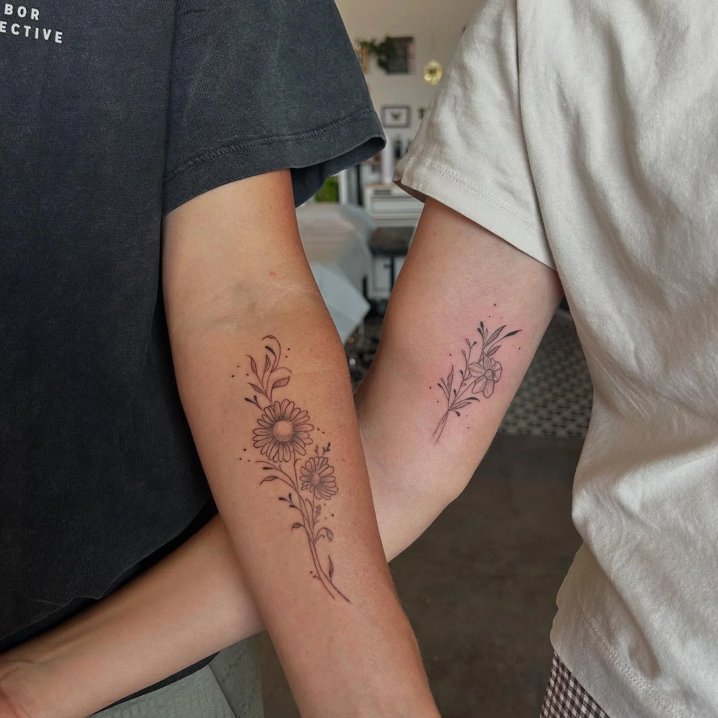 birth flowers for the sweetest couple 🩷🌼 

created at @opaltattoostudio 

✿ books open for the rest of the summer ✿
.
.
.
.
.
#fineline #finelinetattoo #losangeles #losangelestattooartist #qttr #queertattooartist #femaletattooartist