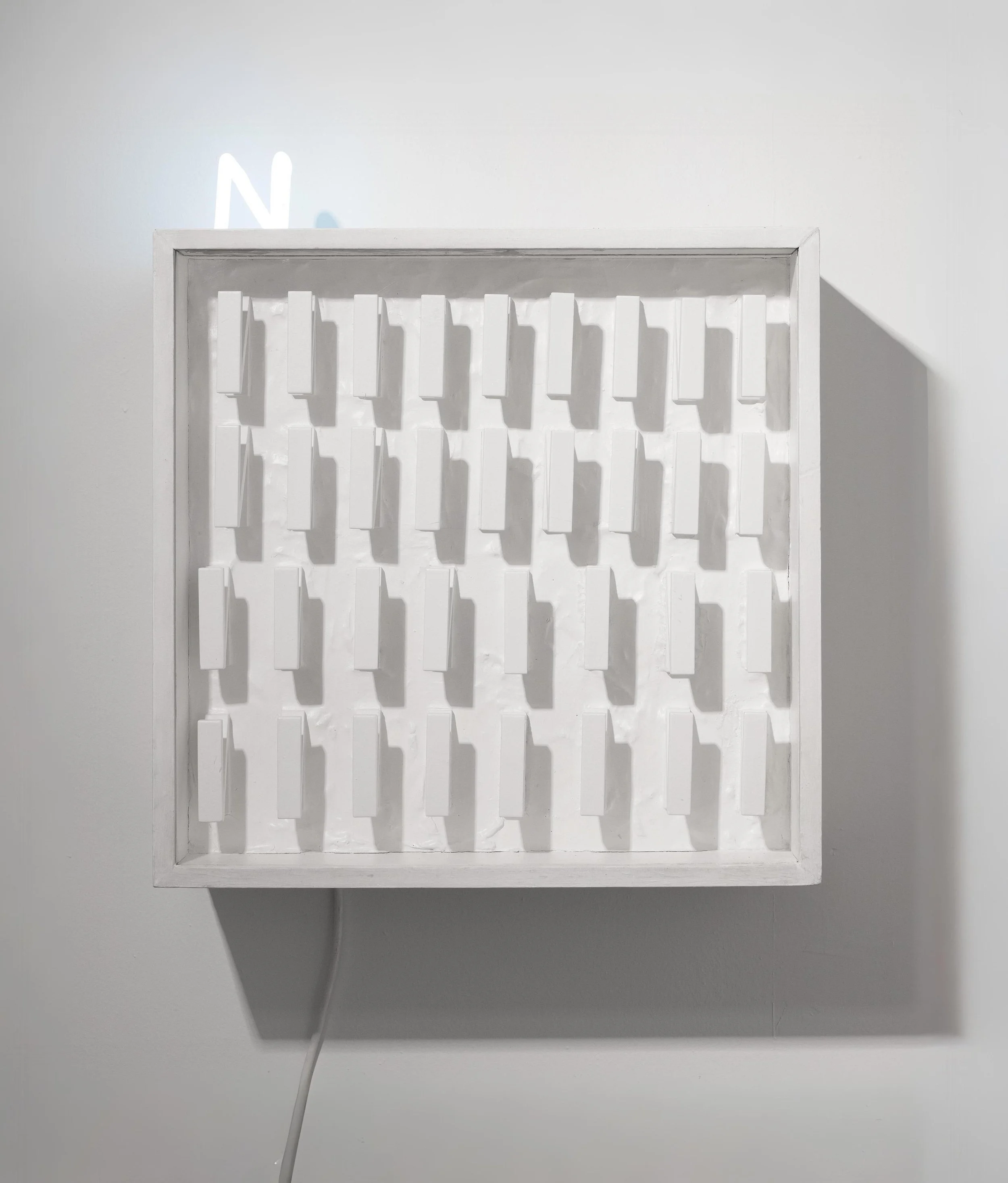 Chryssa
White Plaster with neon N's, 1975 - 1976 
plaster, wood and neon light
49 x 49 x 15 cm