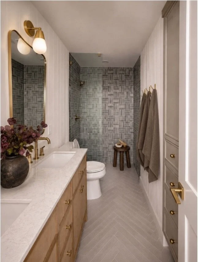 Three teenagers. One bathroom. Not nearly enough storage.

That was really where this bathroom began. The original space had a long vanity, but very little storage for three people actually using it every day. And although the bathroom wasn&rsquo;t p