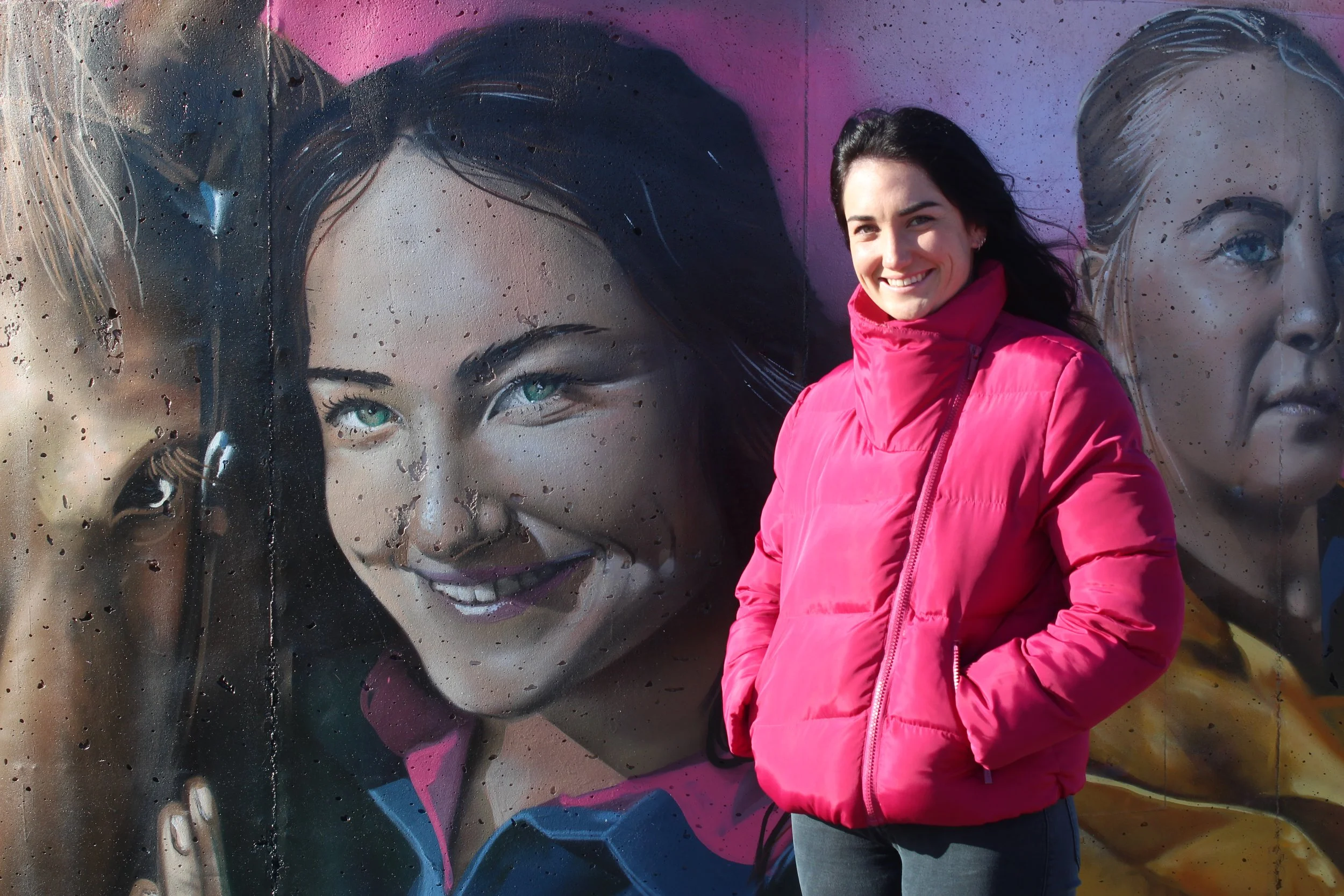 Sixth-generation Gnowangerup farmer Shelby Garnett with her mural