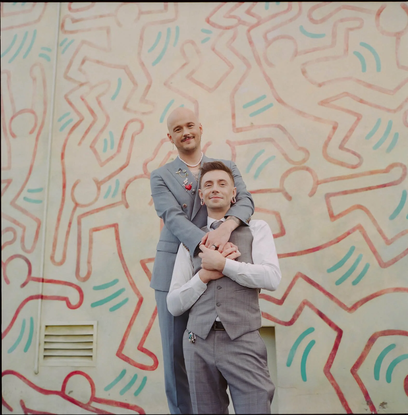 Gay wedding couple Keith Haring mural