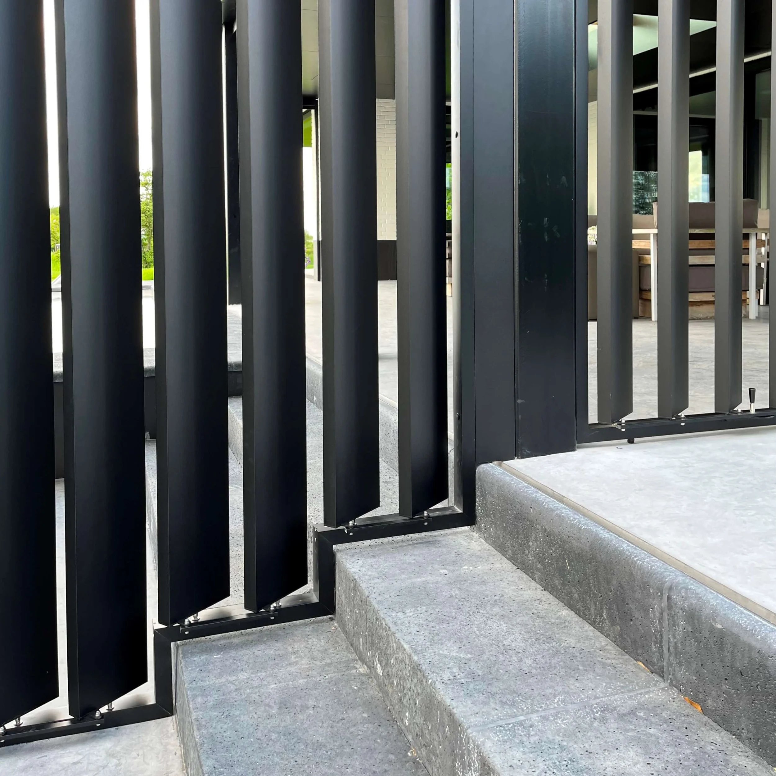 close up view of vertical external louvres fitted to a new build home by Sunshield louvres