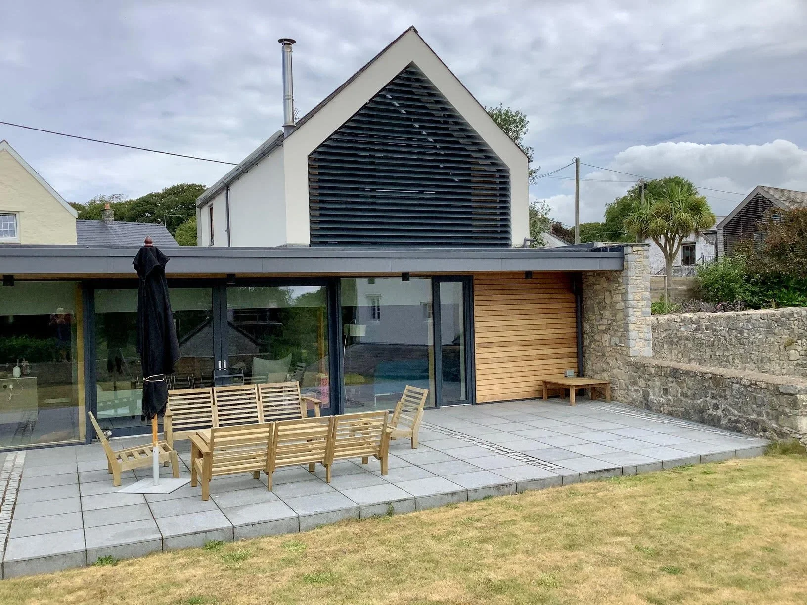 external louvres fitted to a west facing window with apex shape