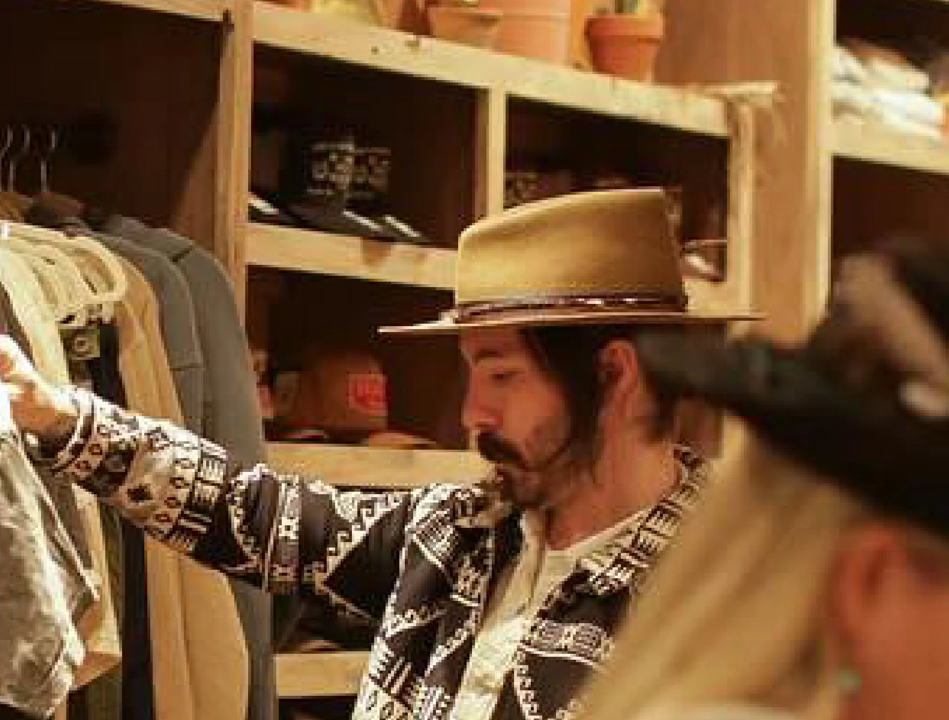 A customer looking at items in the Nic & Maude store